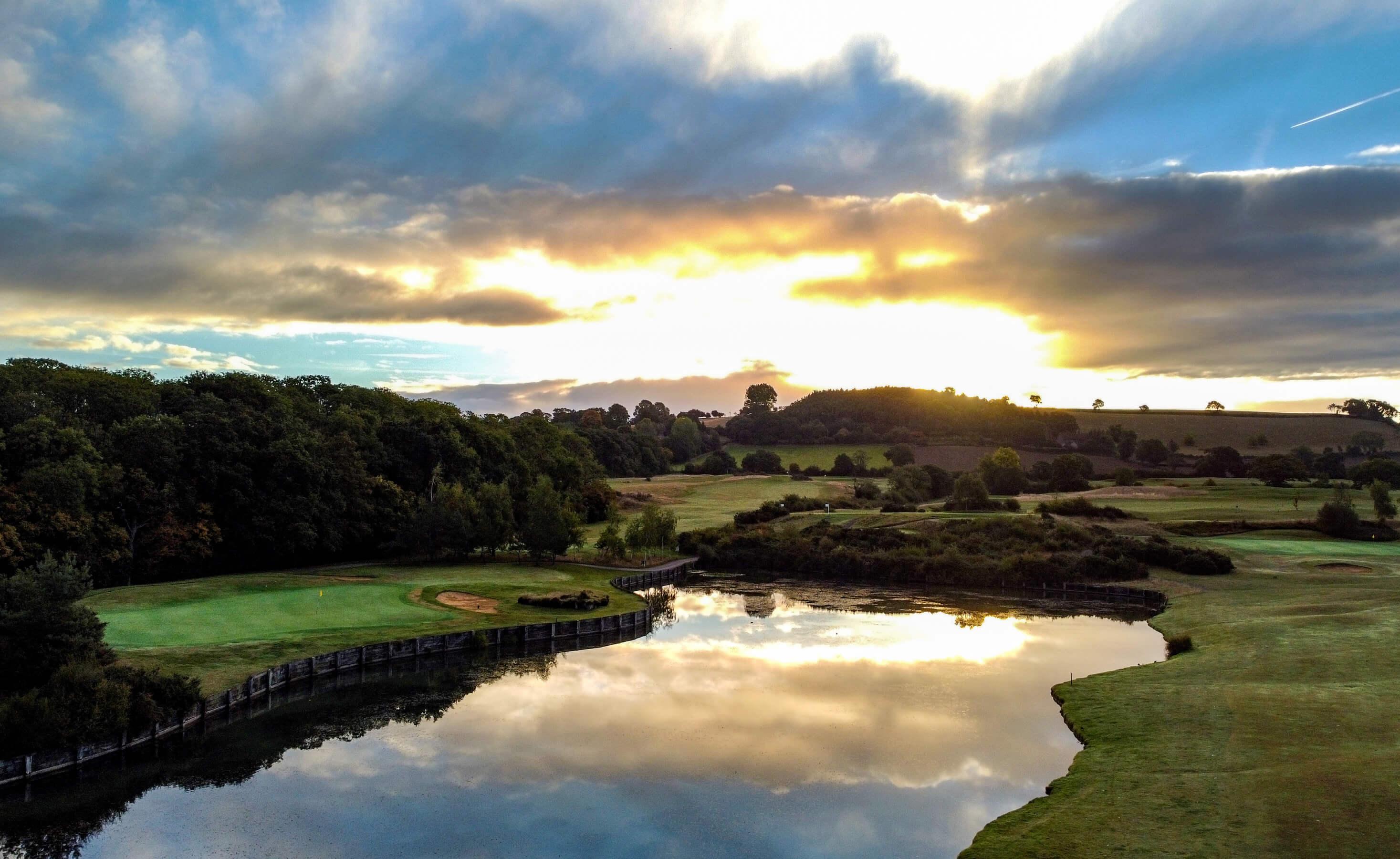 A water hazard separating two well maintained fairways at The Players Club