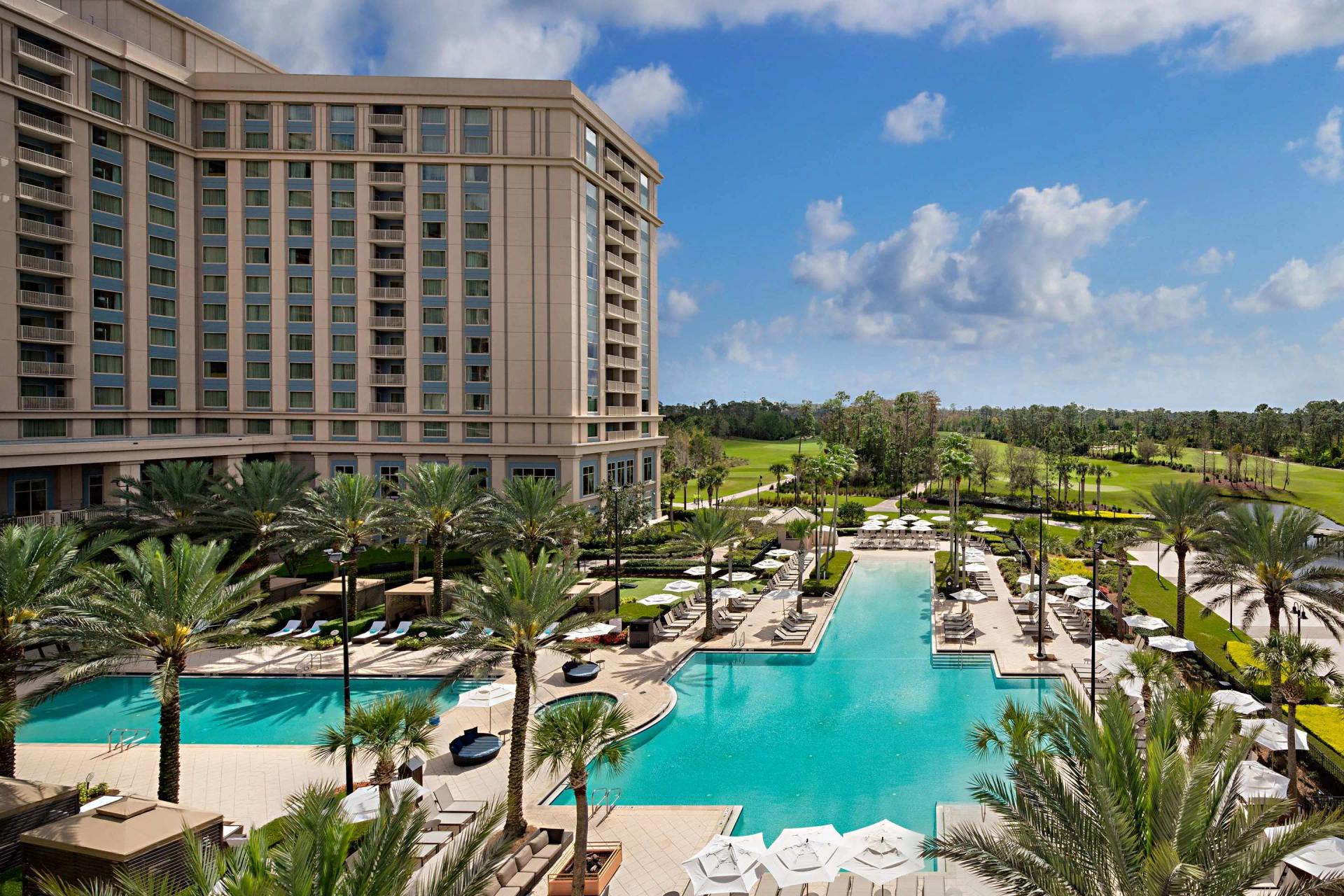 Panoramic view of the Waldorf Astoria building overlooking the outdoor pool