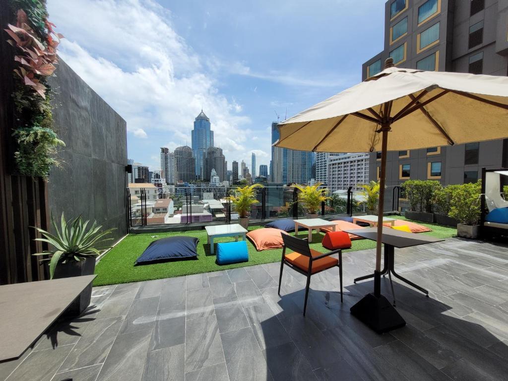 Rooftop lounging area at Citrus Suites