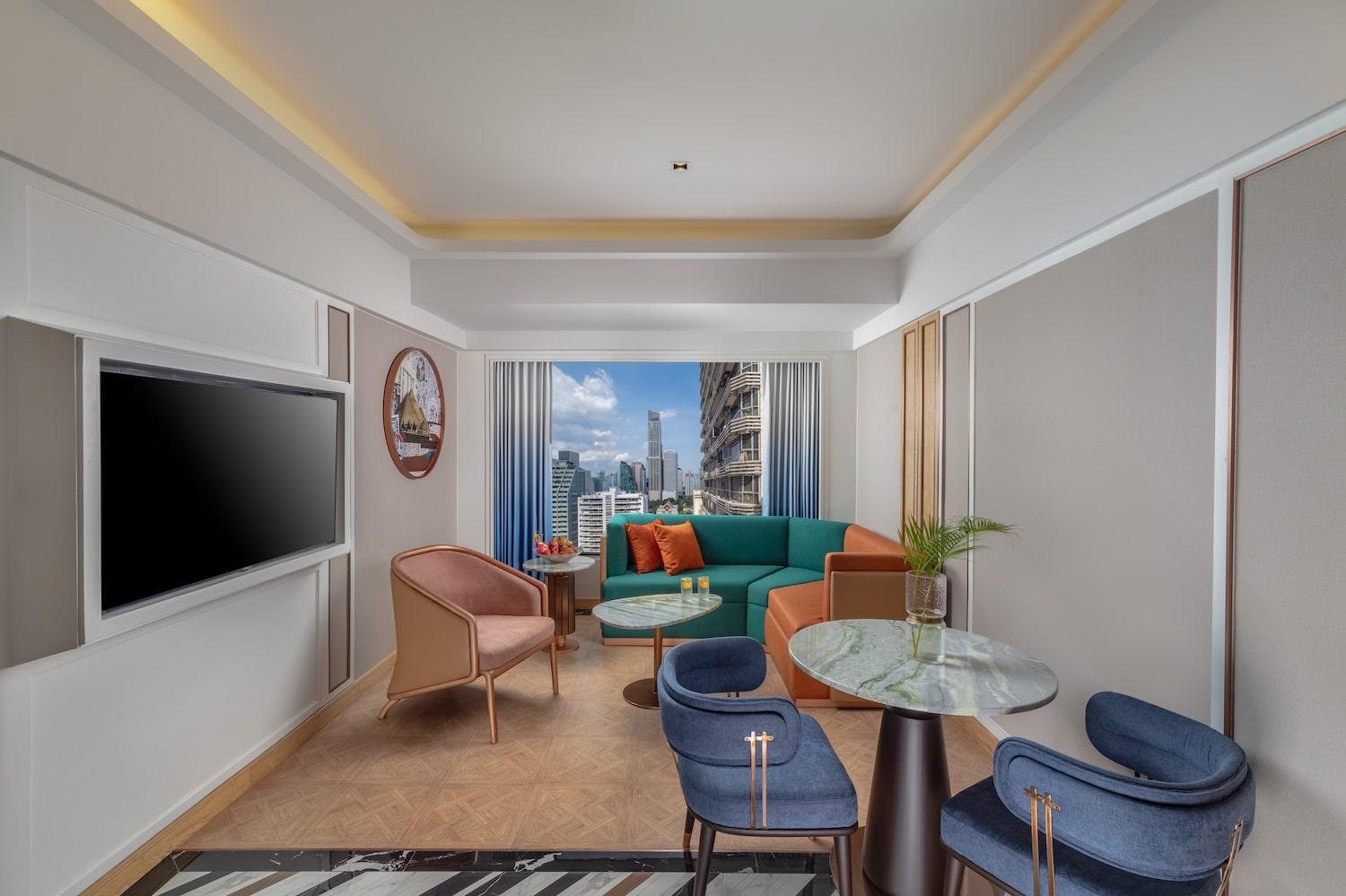 Living room as part of a double bed suite at pipa hotel bangkok