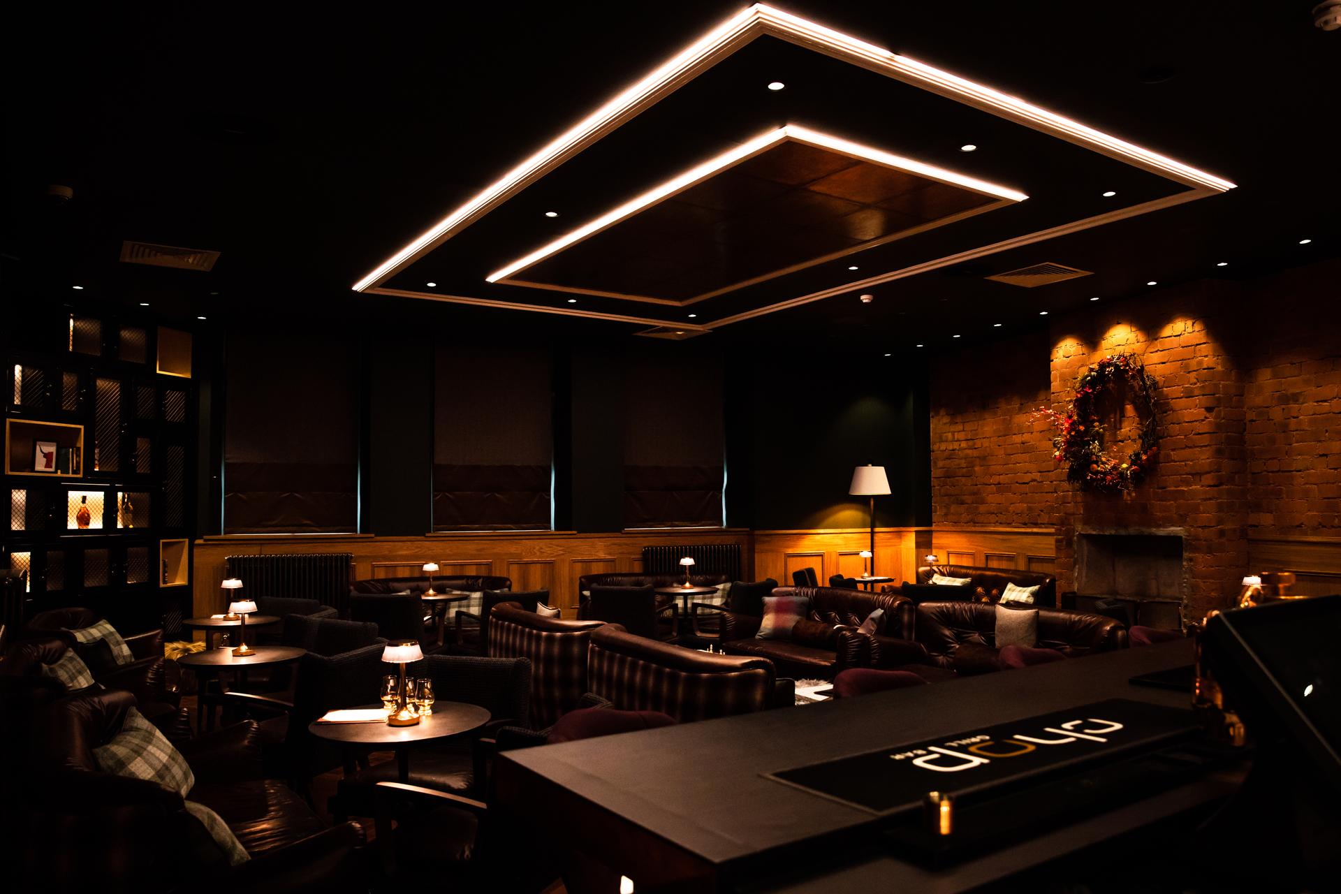 Indoor dining area and bar at The Sandman