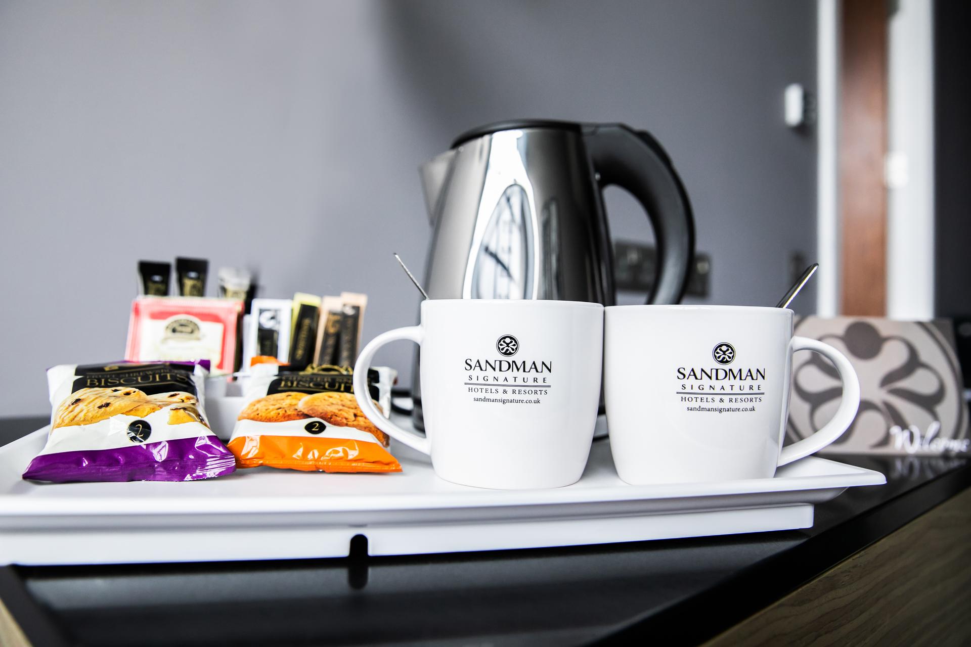 Tea and branded cups as part of a suite at The Sandman
