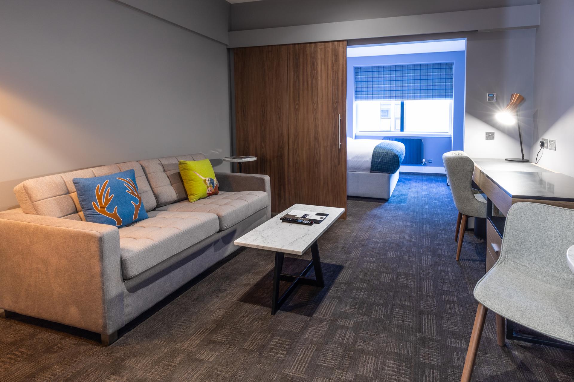 Double bed suite at The Sandman with a separate living room area