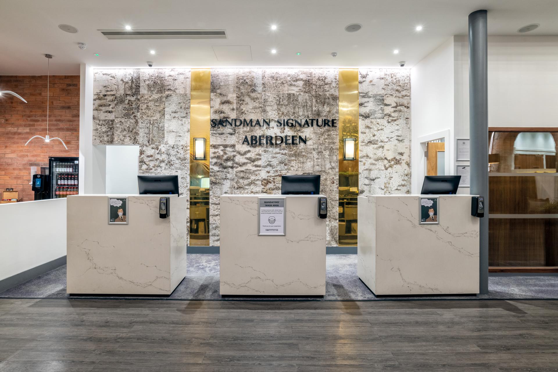 Front desk check in at the reception of The Sandman