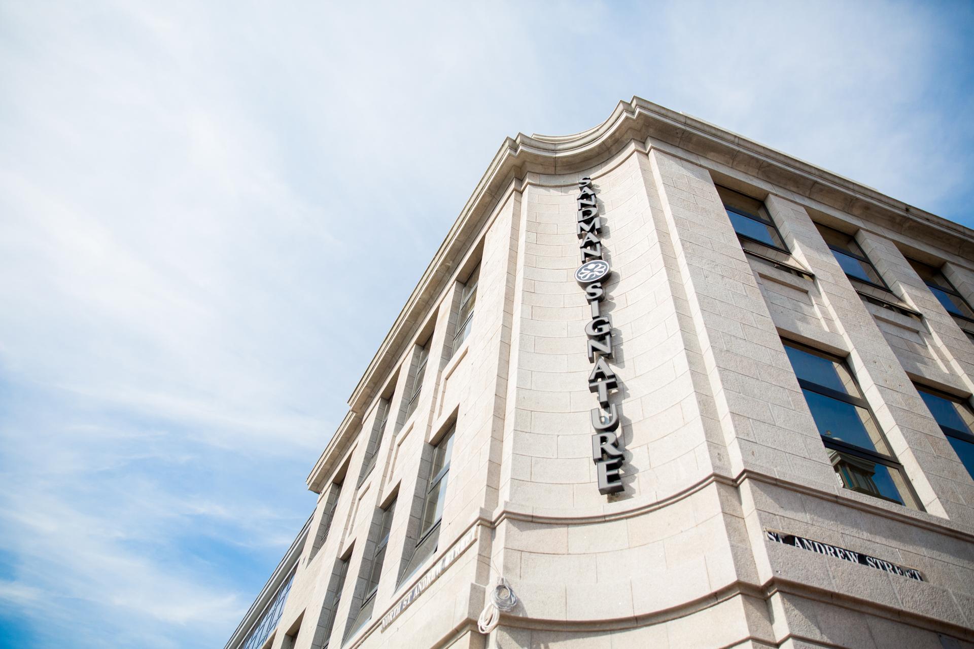 The Sandman sign on the building