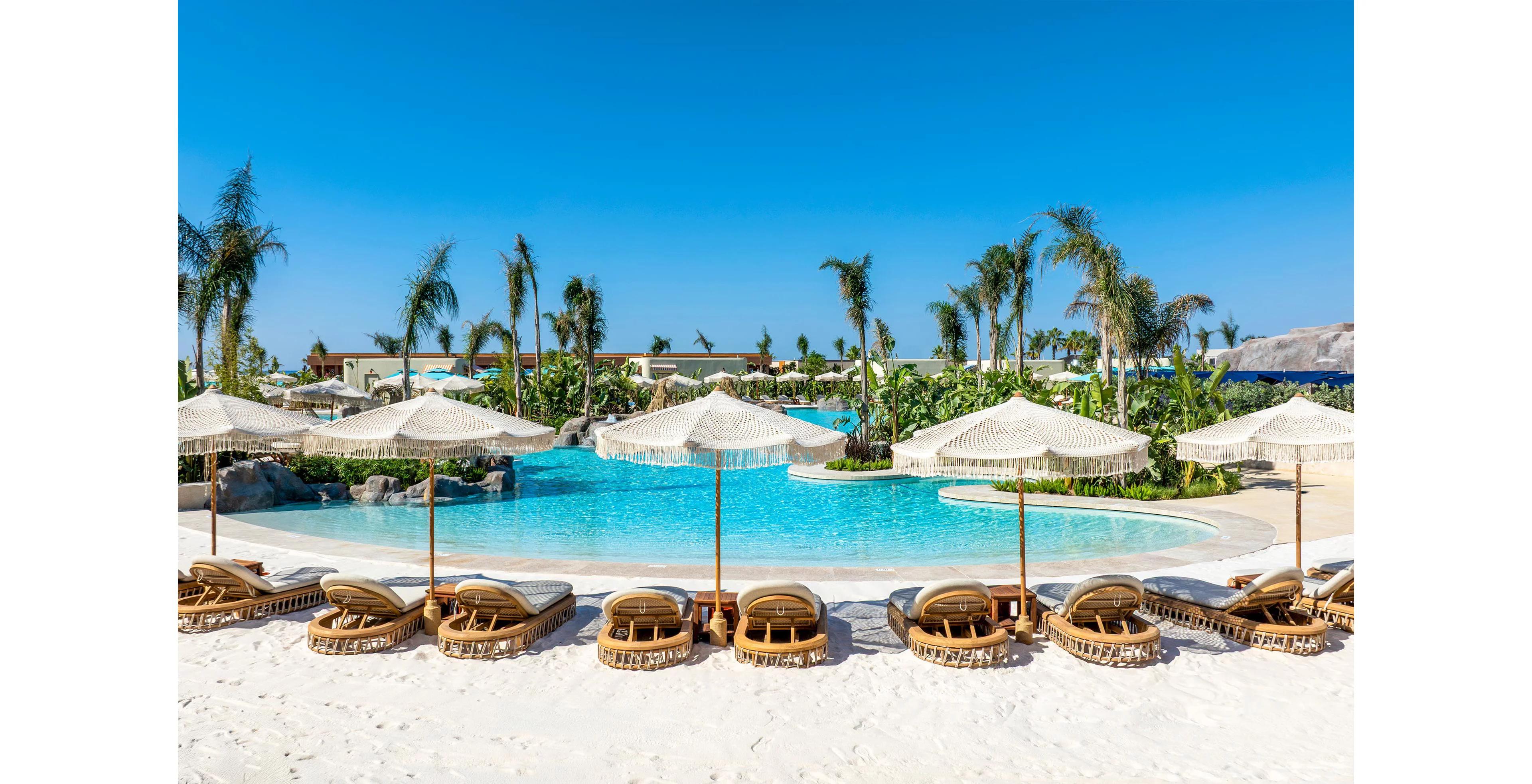 hotel poolside with sunbeds