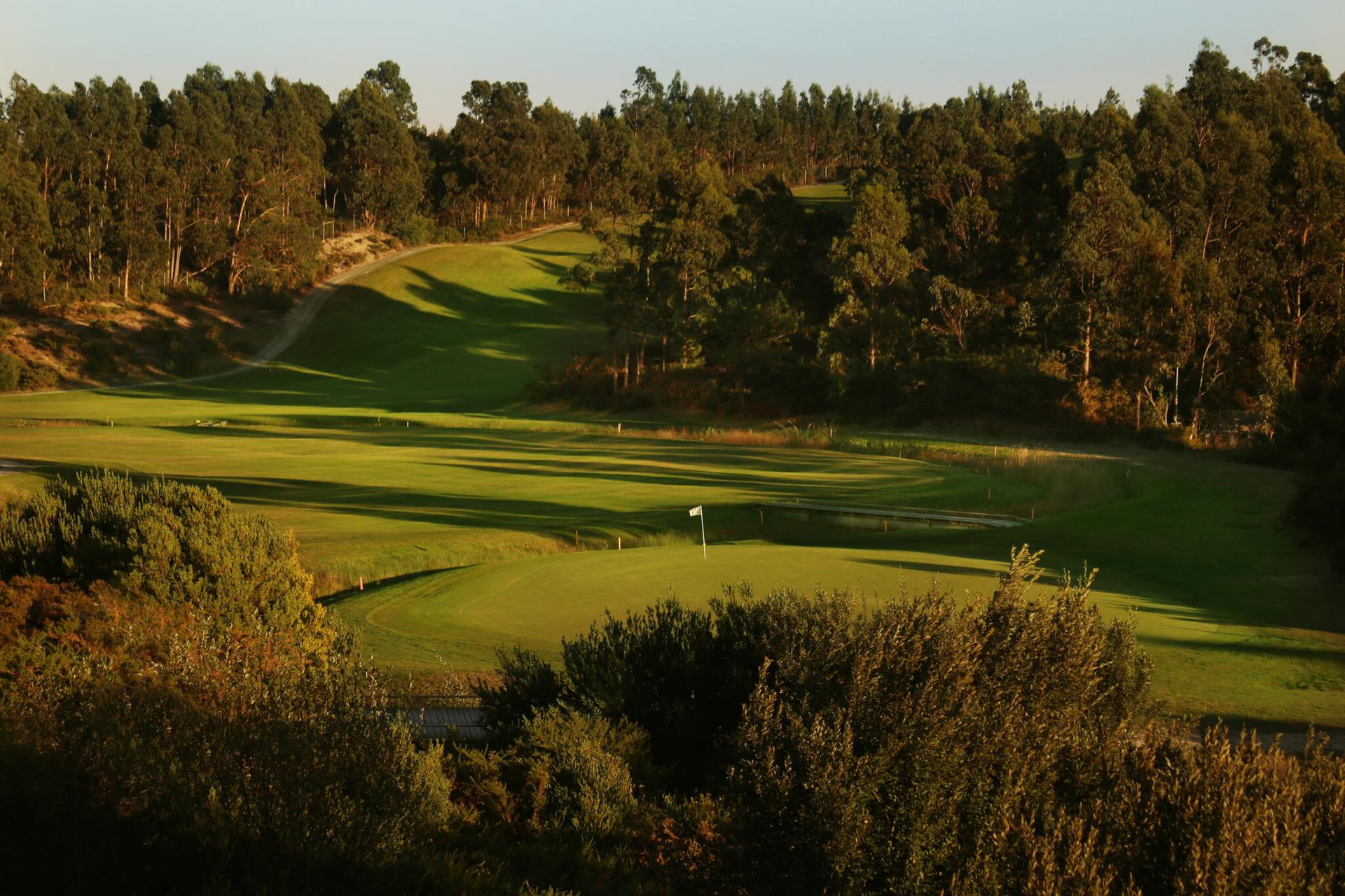 A well maintained fairway leading to a smooth green