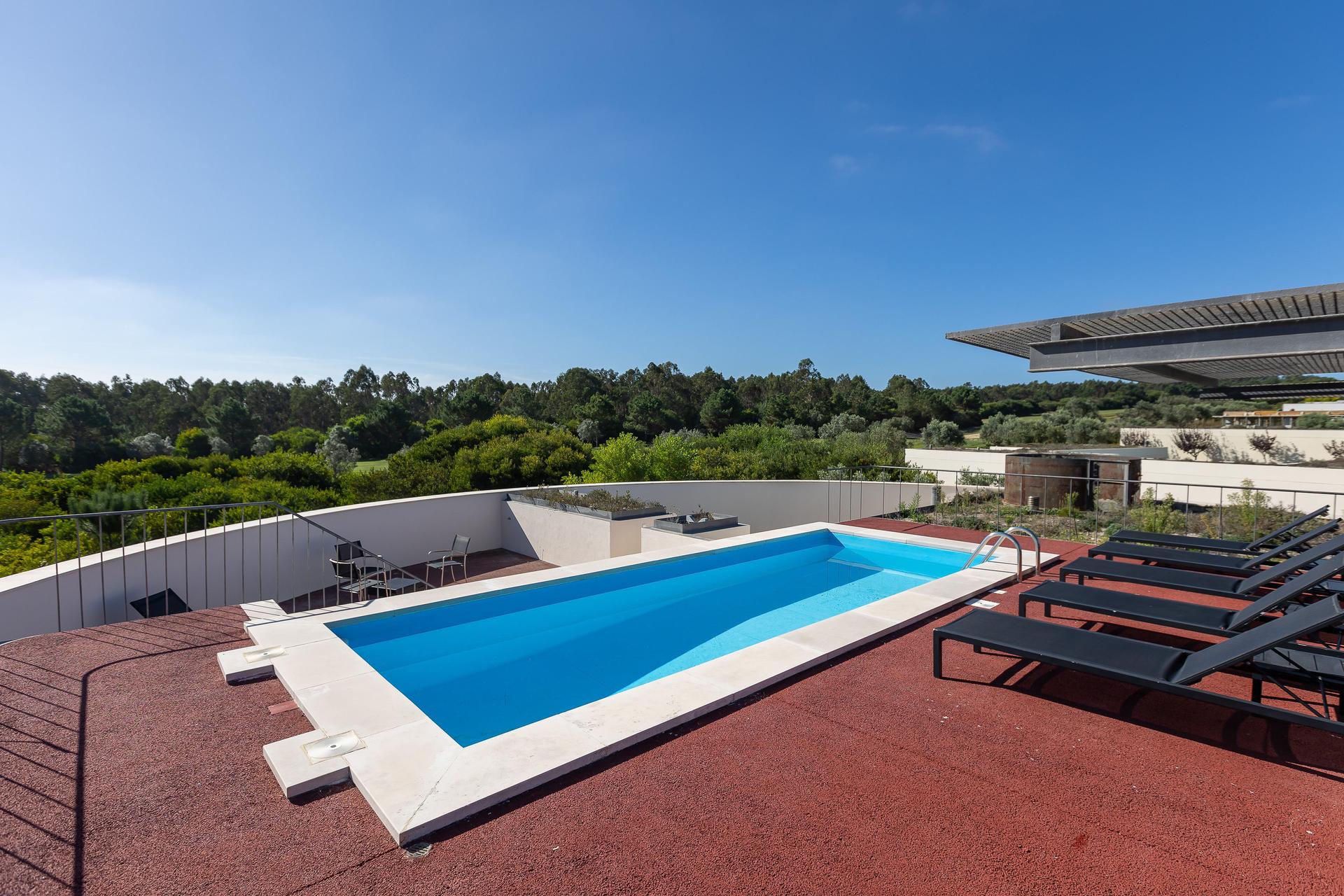 Outdoor pool at Bom Sucesso Resort