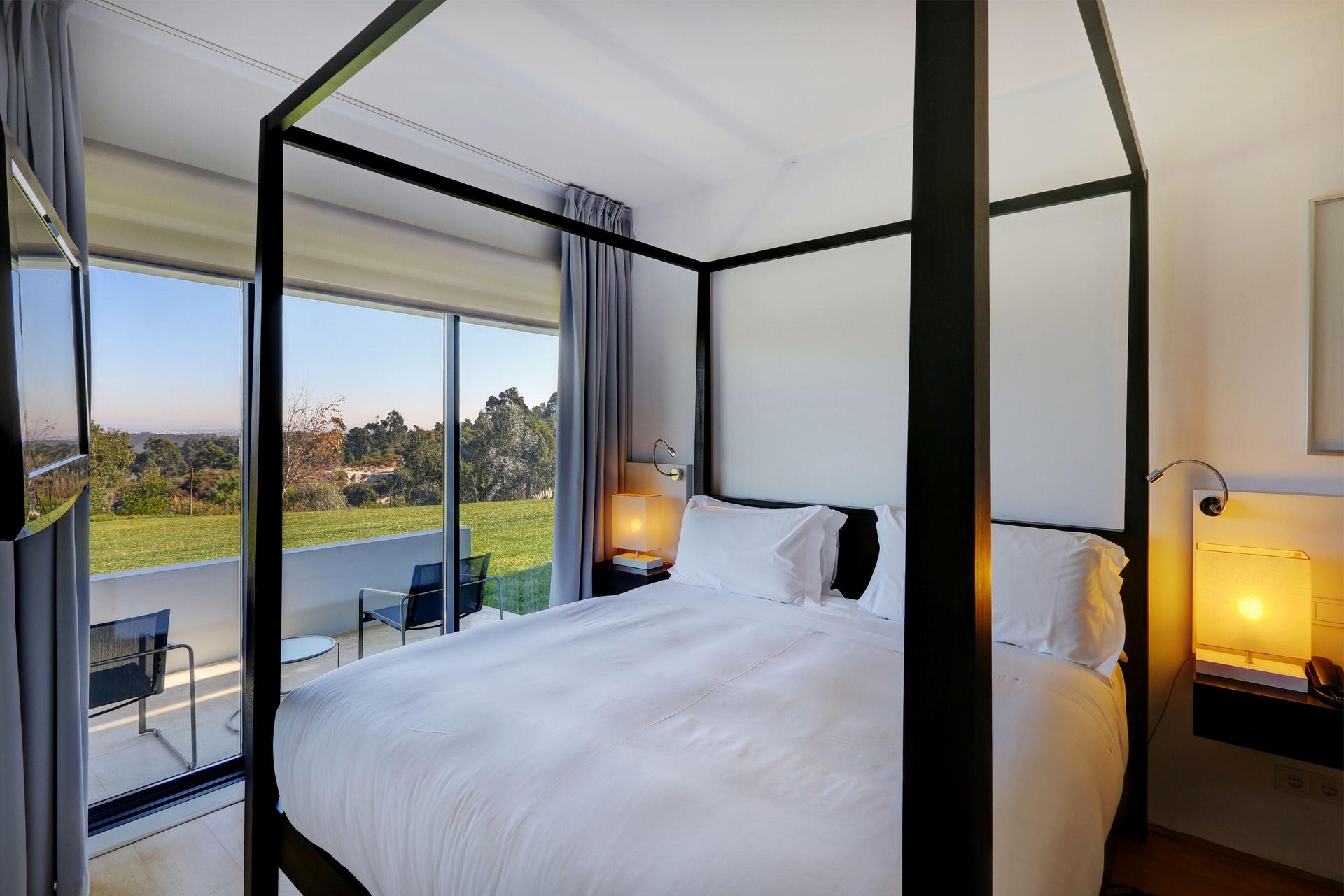 Double bed room as part of a villa at Bom Sucesso Resort