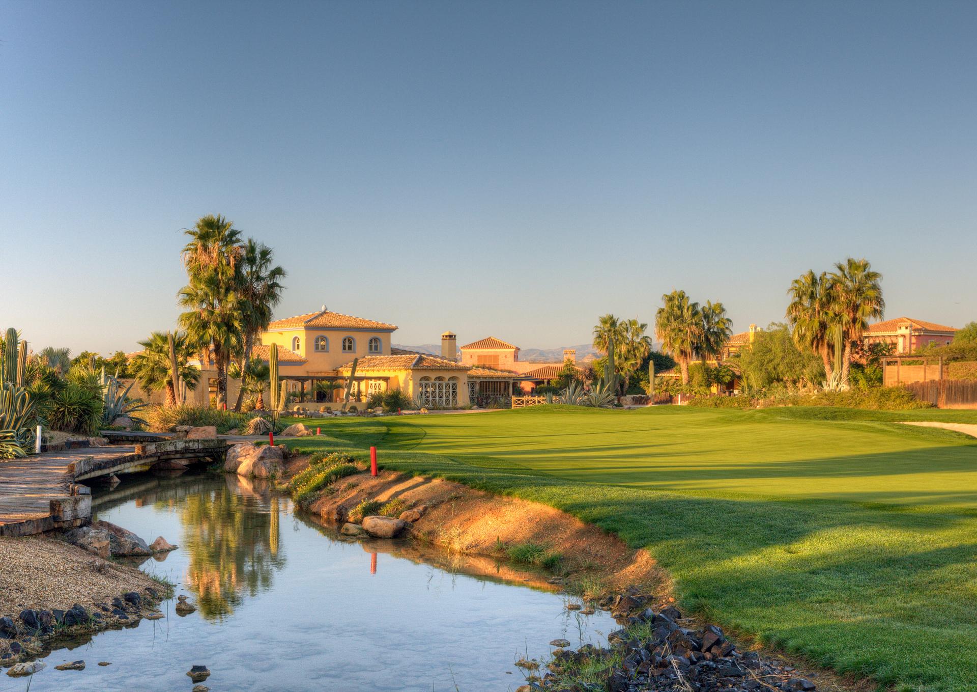 Panoramic view of the Desert Springs Resort building overlooking the course