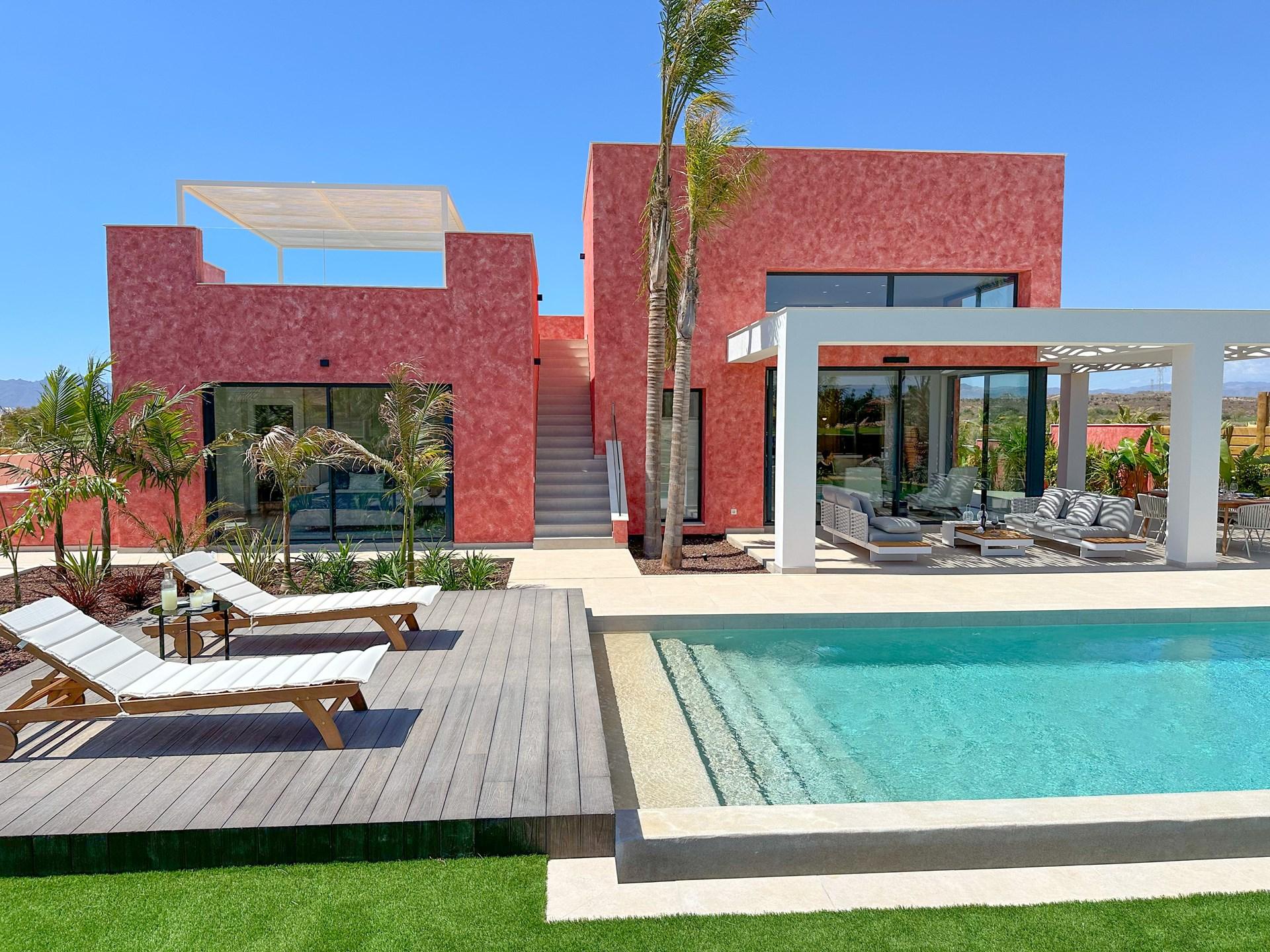 Panoramic view of a villa overlooking an outdoor pool at Desert Springs Resort