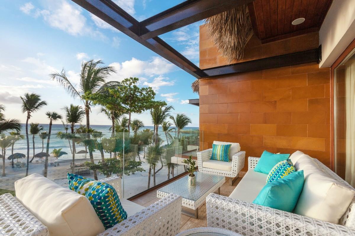 Balcony lounging area as part of a suite at Eden Roc at Cap Cana