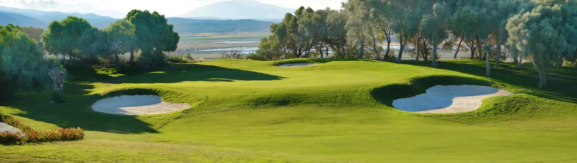 Panoramic view of a well maintained fairway nestled with sand bunkers