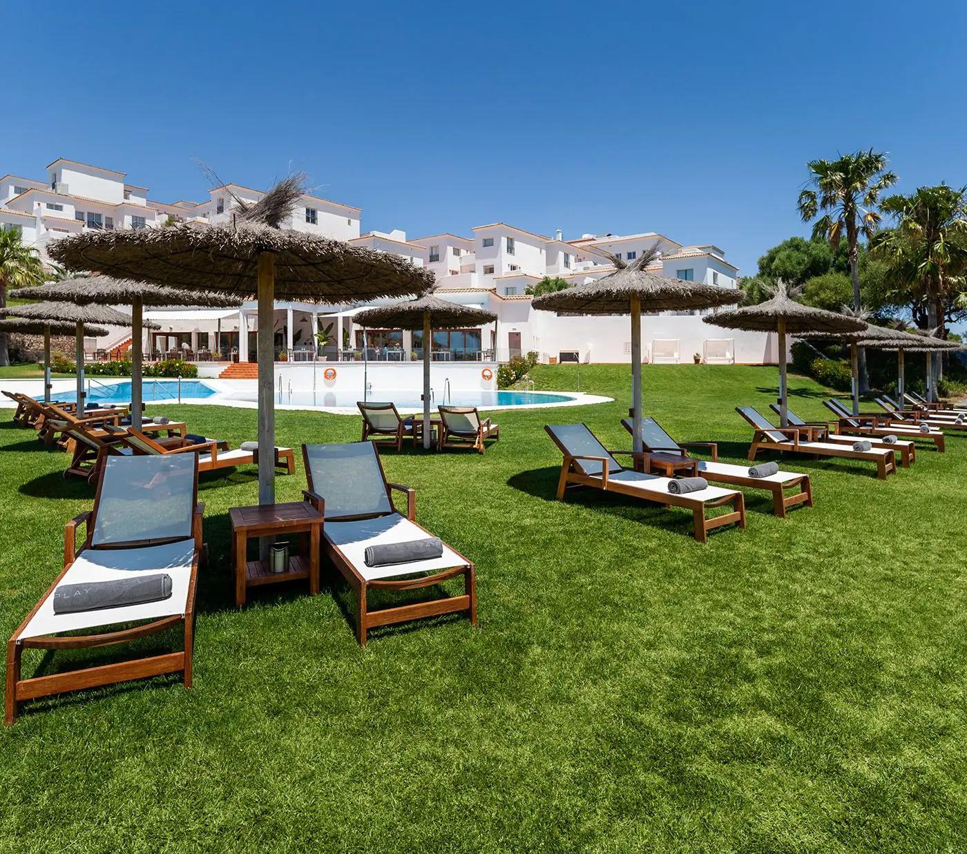 Poolside sunbeds at Fairplay Golf & Spa Resort