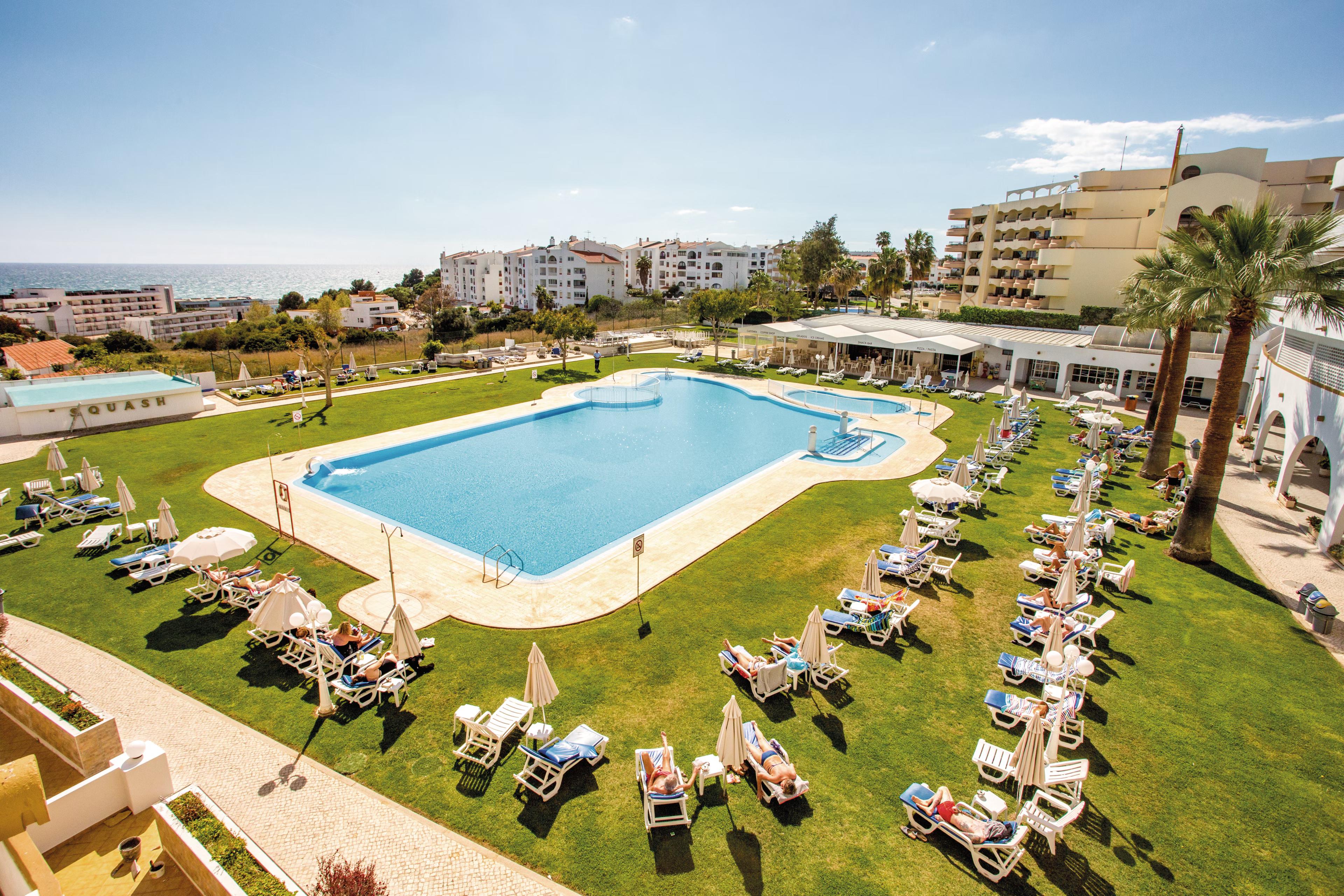 Overhead view of the outdoor swimming pool at Hotel Brisa Sol