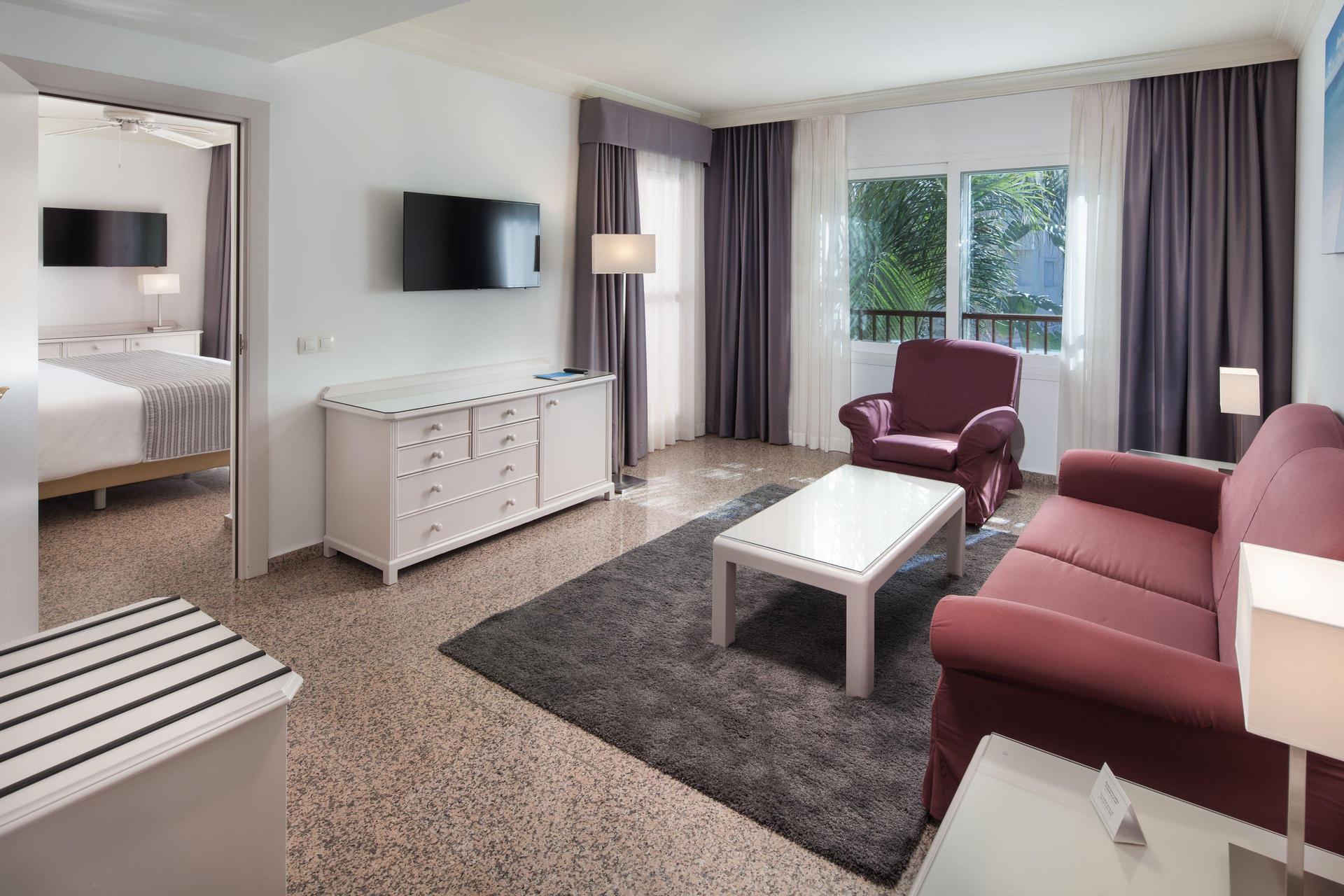 Living room as part of a double bed suite at Hotel MAC Puerto Marina