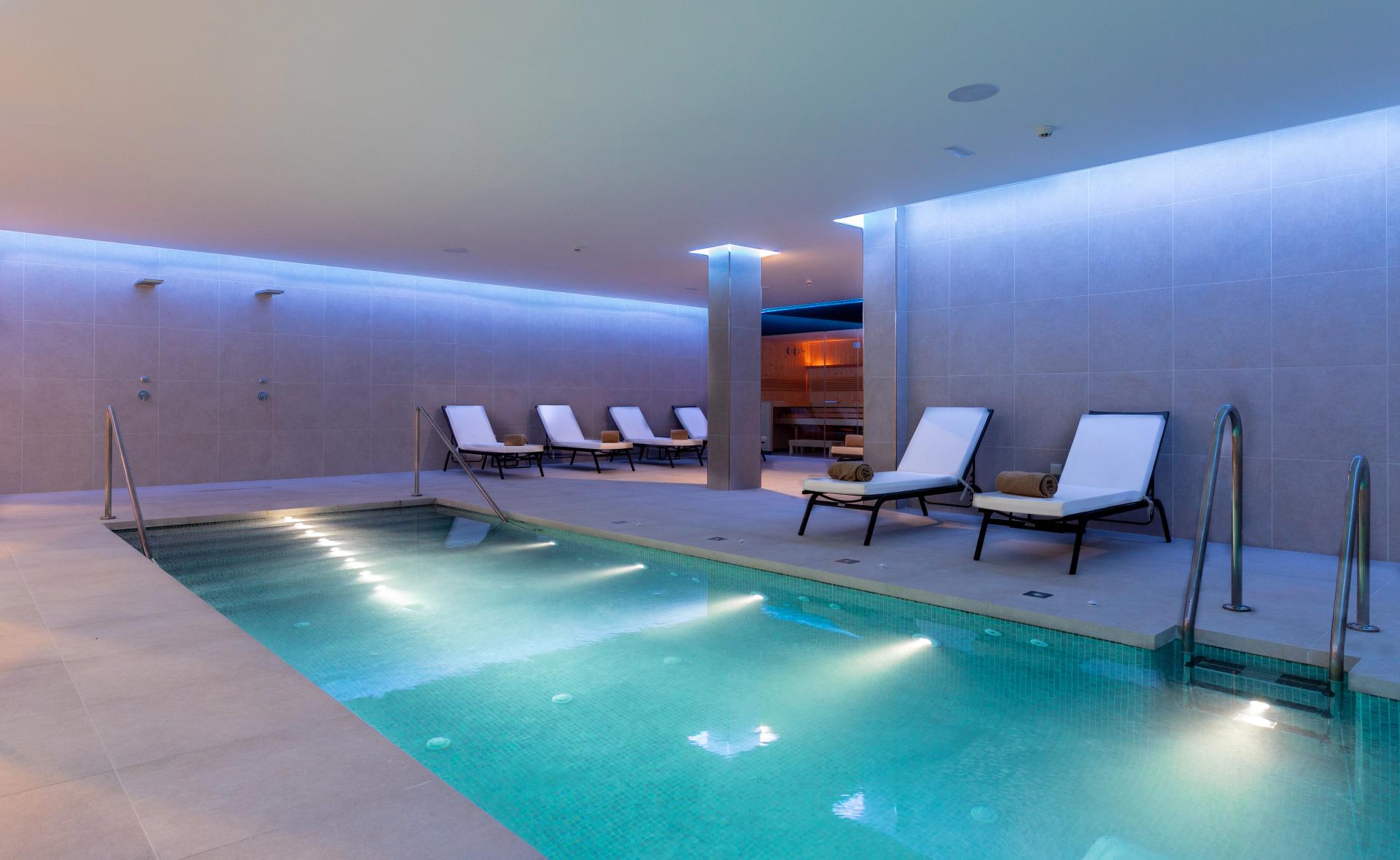 Indoor pool as part of spa facilities at Hotel MAC Puerto Marina