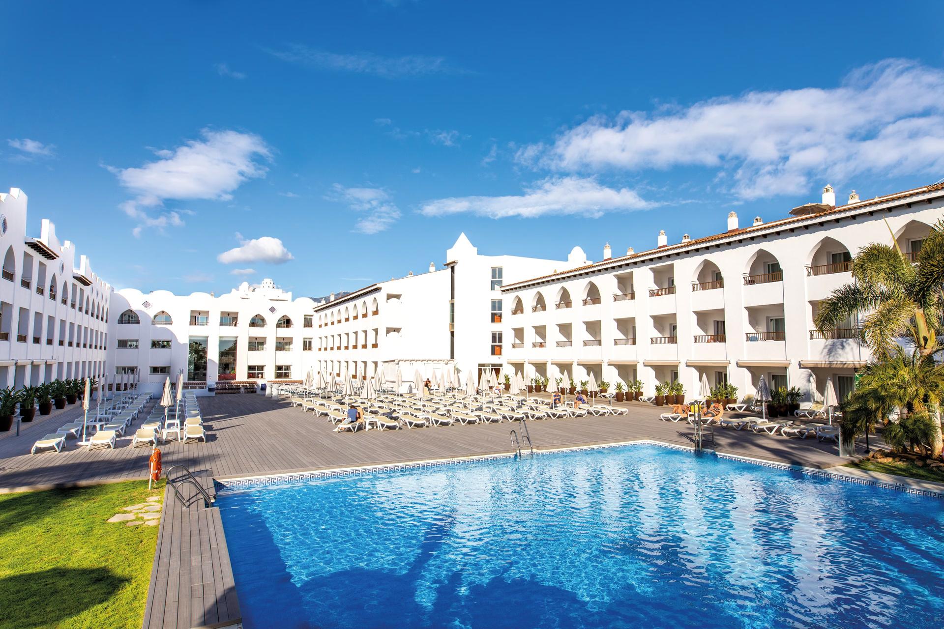 Panoramic view of Hotel MAC Puerto Marina overlooking the outdoor pool