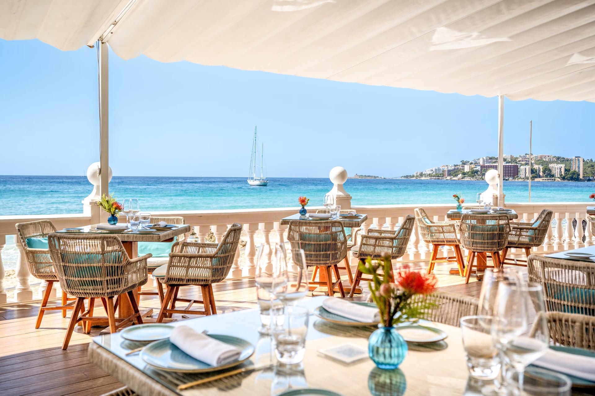 Rooftop dining with coastal views at Hotel Nixe Palace