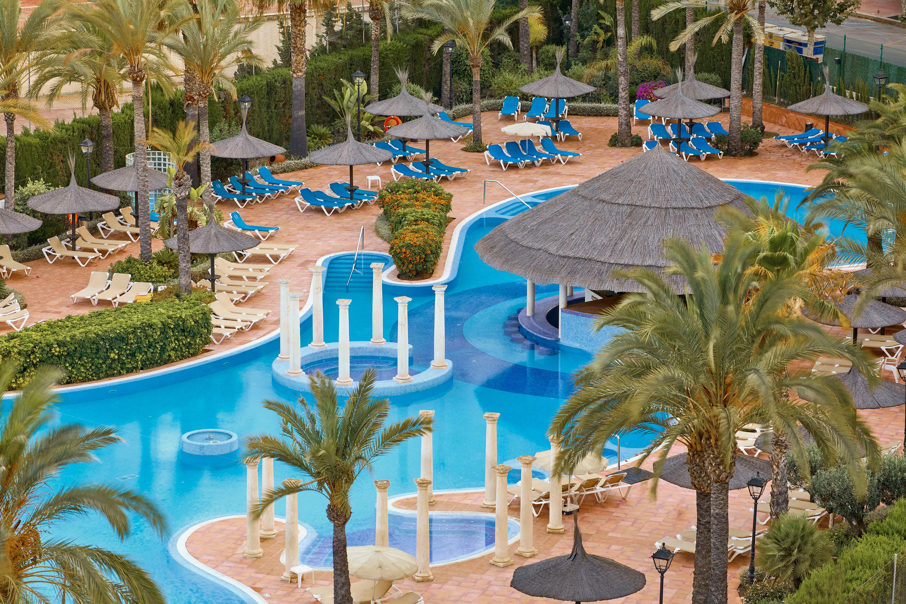 Overhead view looking down on the outdoor swimming pool at Hotel Sol Pelicanos Ocas