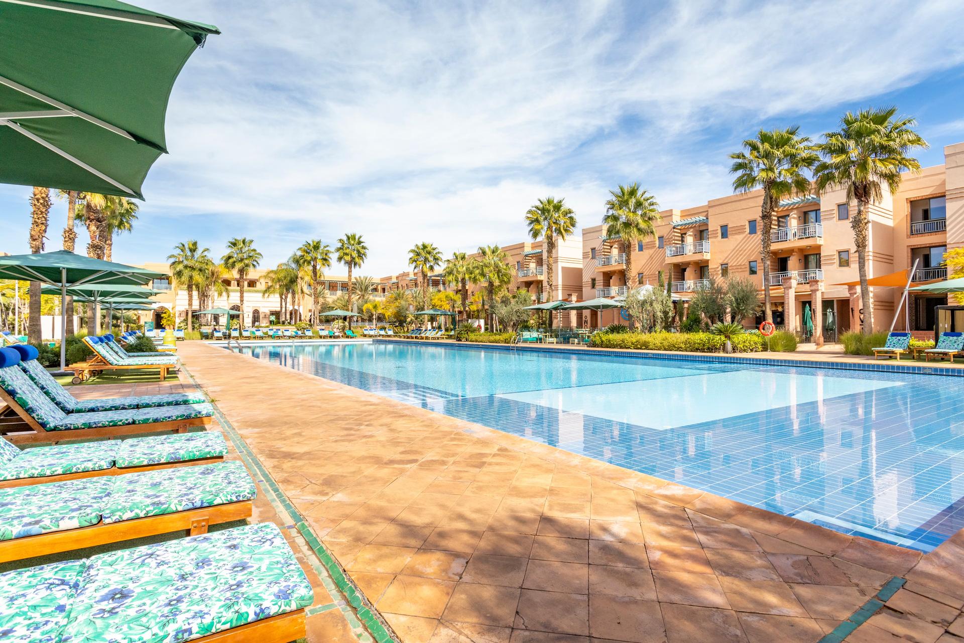 Panoramic view of the outdoor swimming pool at Jaal Riad Resort