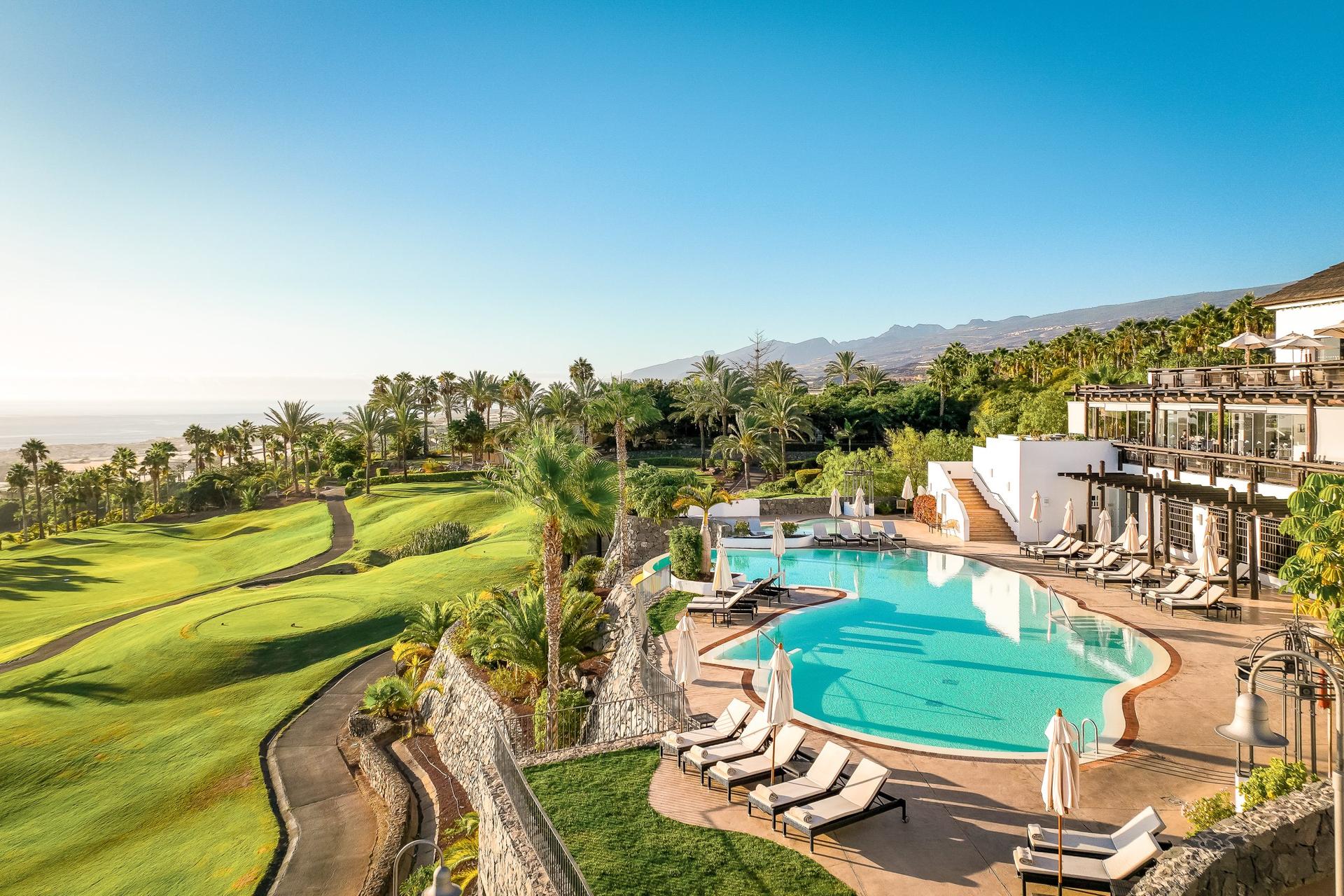 Outdoor pool with views of the golf course at Las Terrazas de Abama