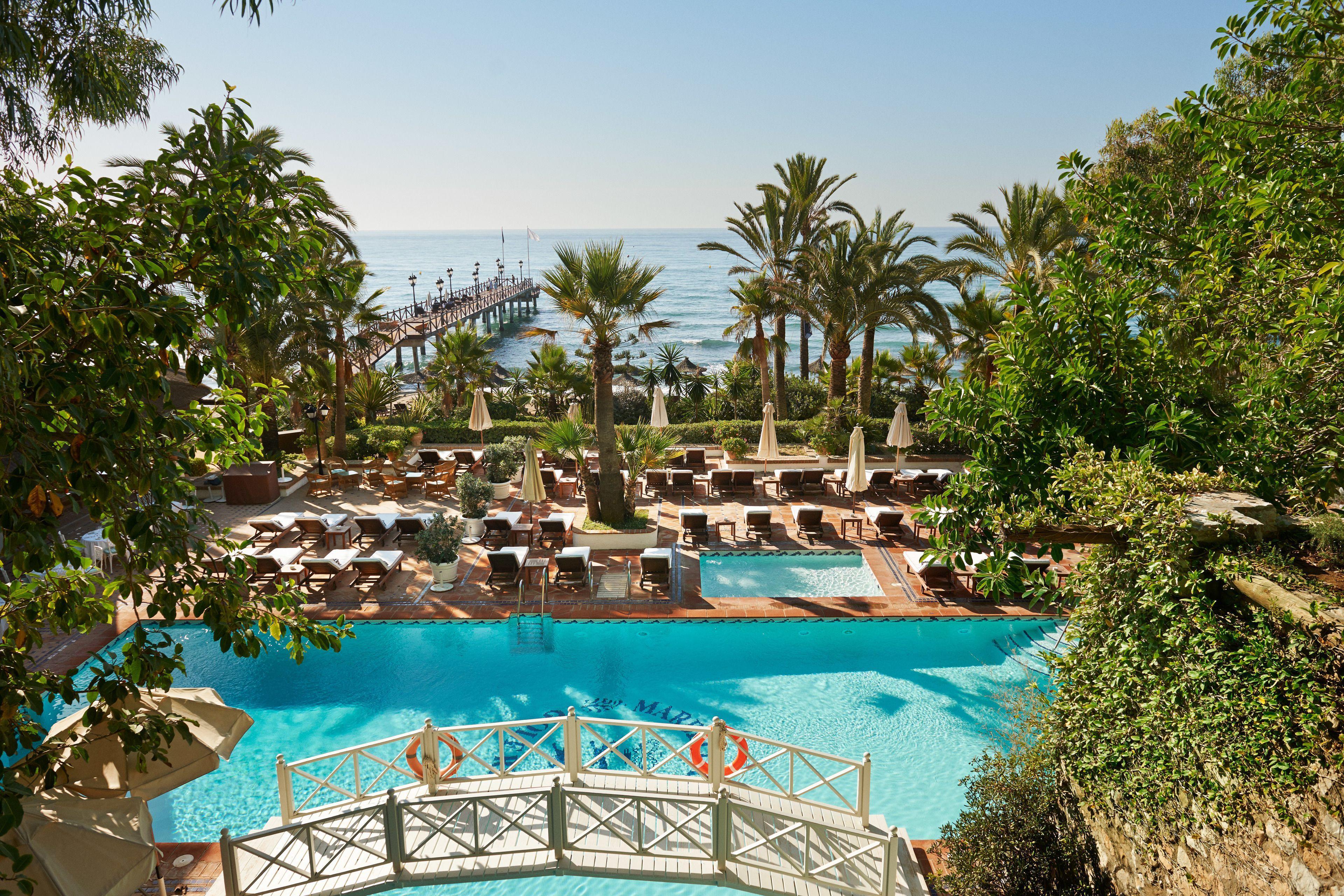 Panoramic view of the outdoor swimming pool at Marbella Club Hotel