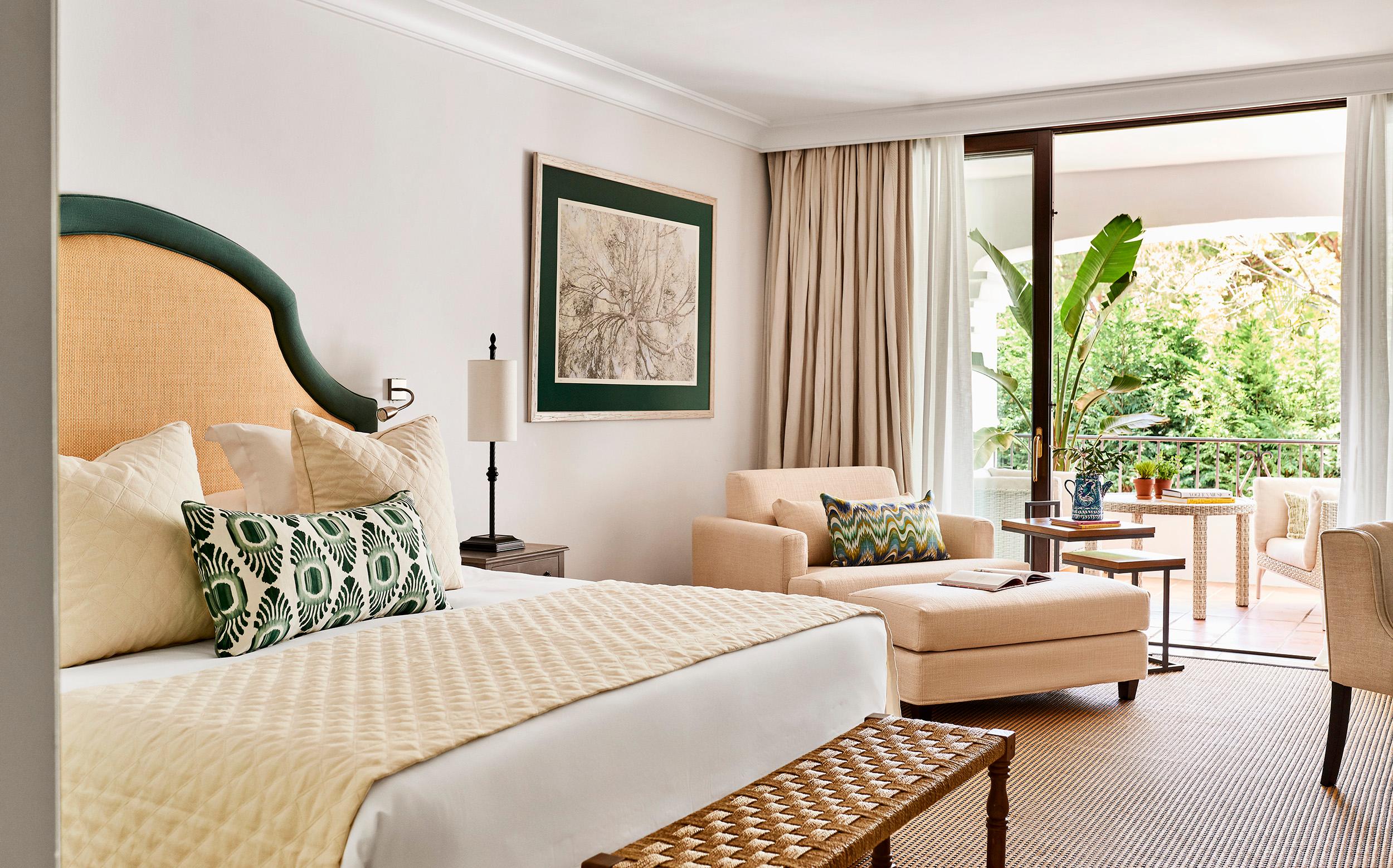 Spacious double bed suite at Marbella Club Hotel with a balcony space