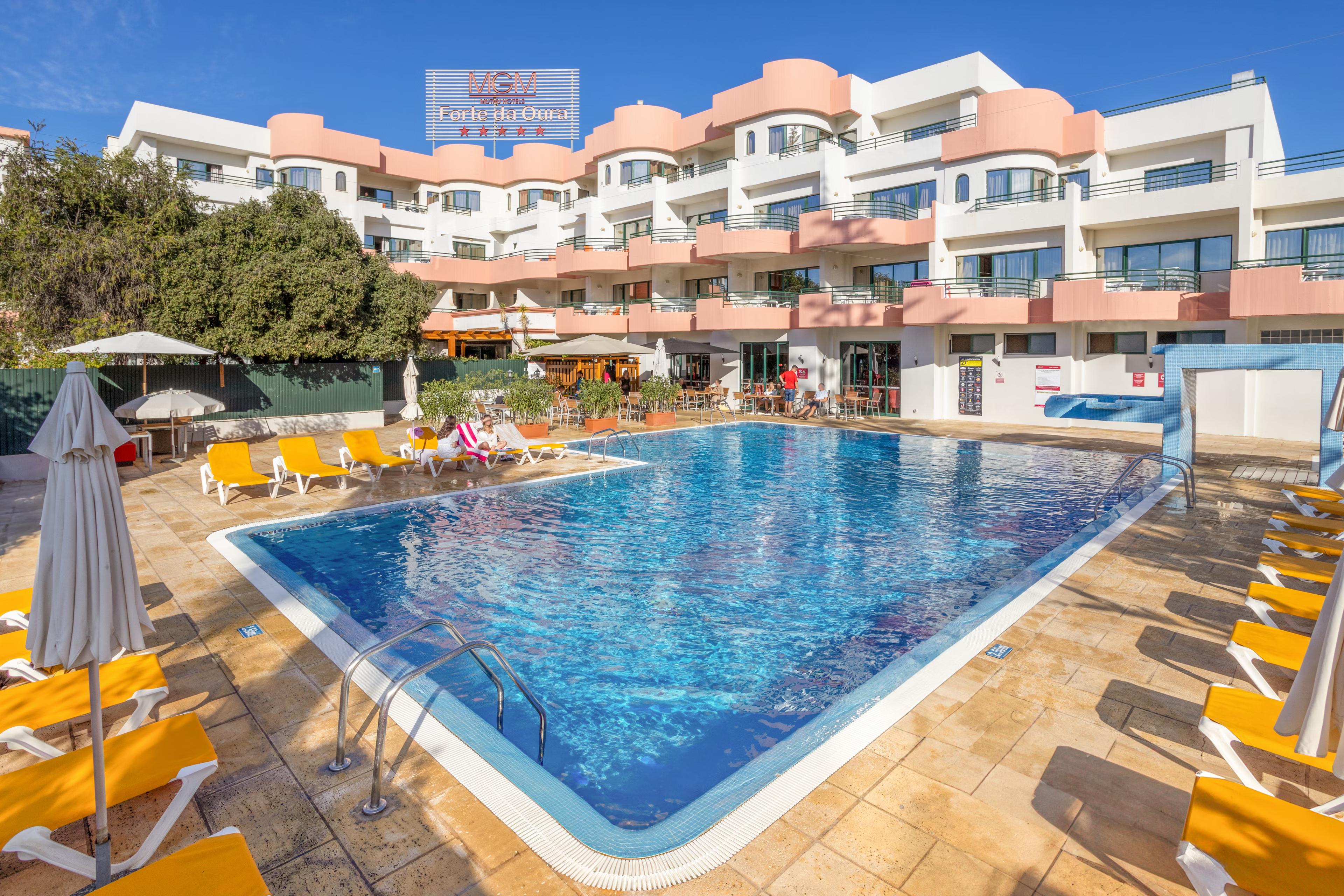 Panoramic view of the Muthu Forte da Oura building overlooking the outdoor pool