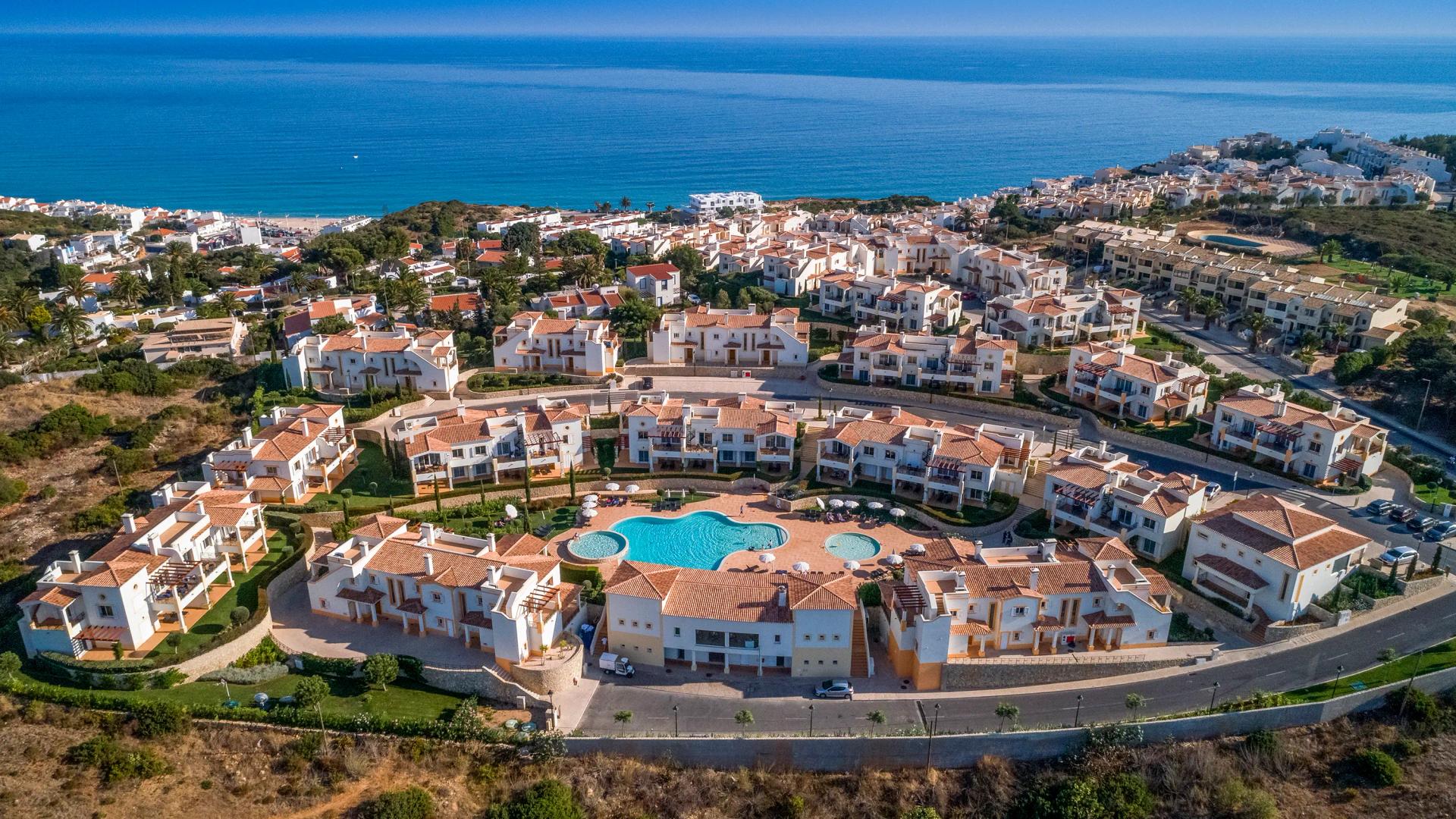 Overhead view of the coastal Salema Beach Village