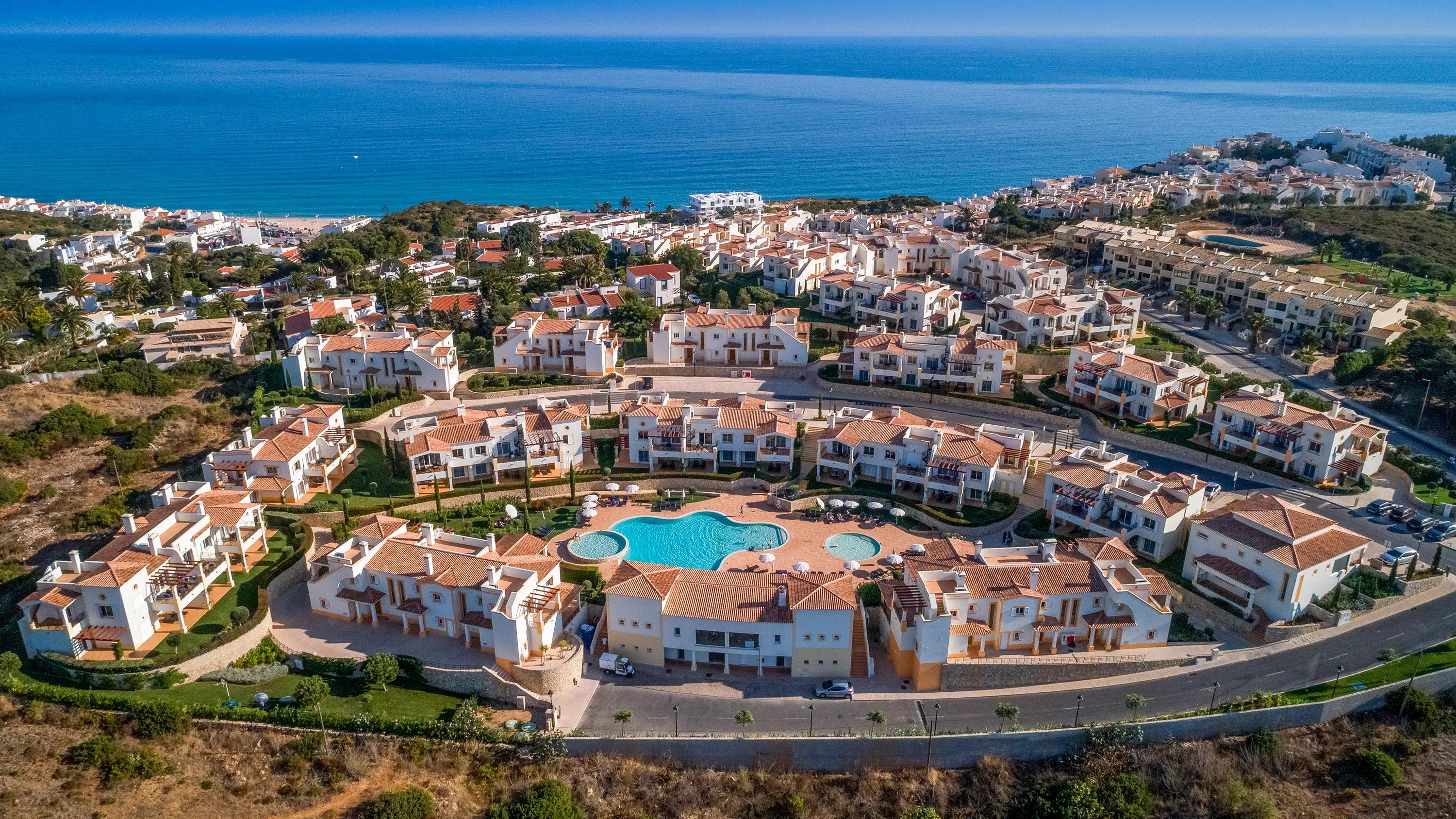 Overhead view of the coastal Salema Beach Village