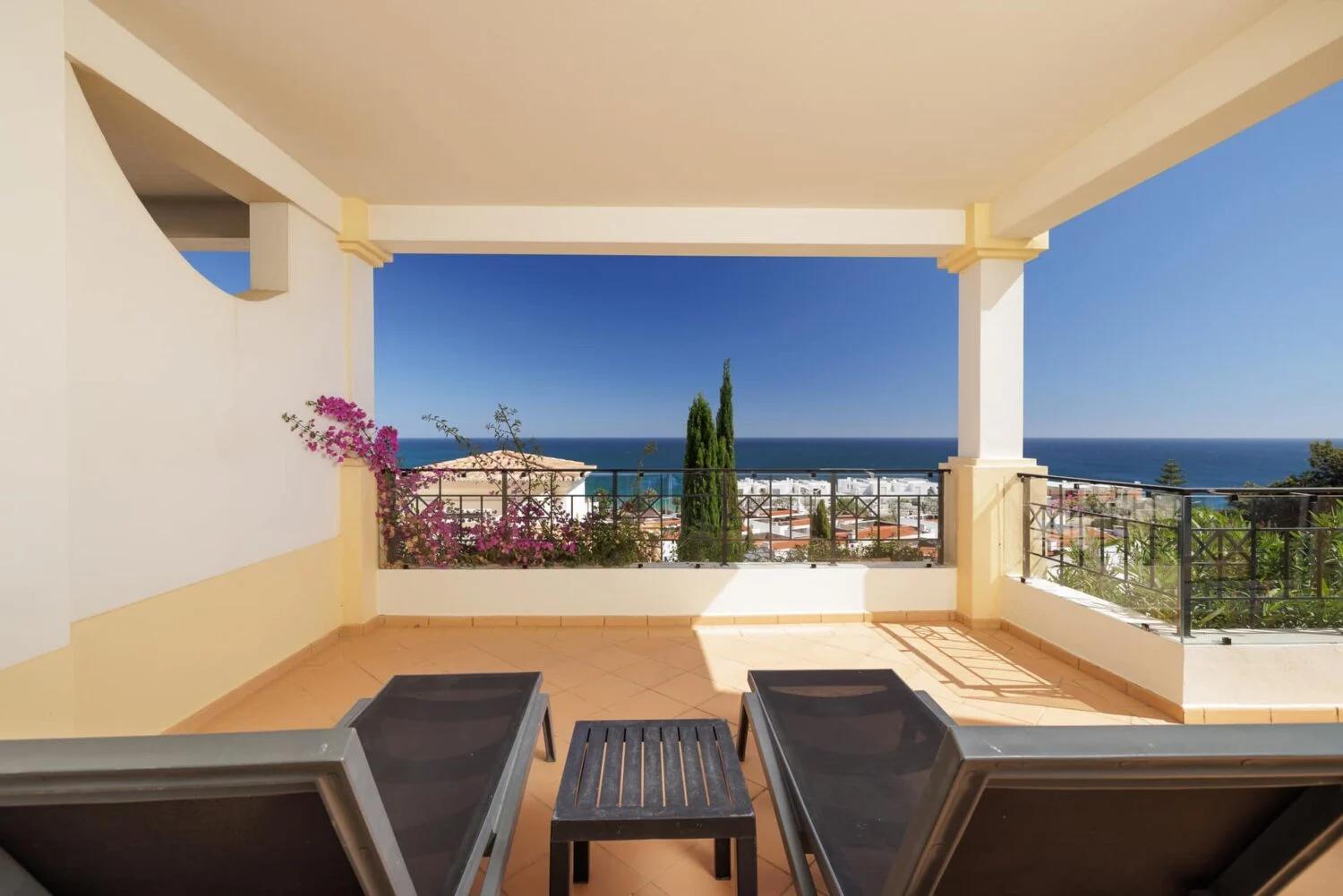 Balcony views nestled with sunbeds