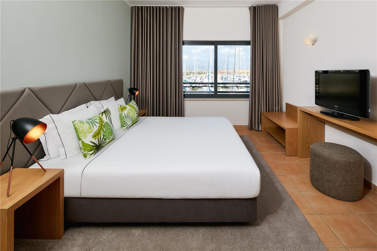 Double bed suite at NH Marina Portimão