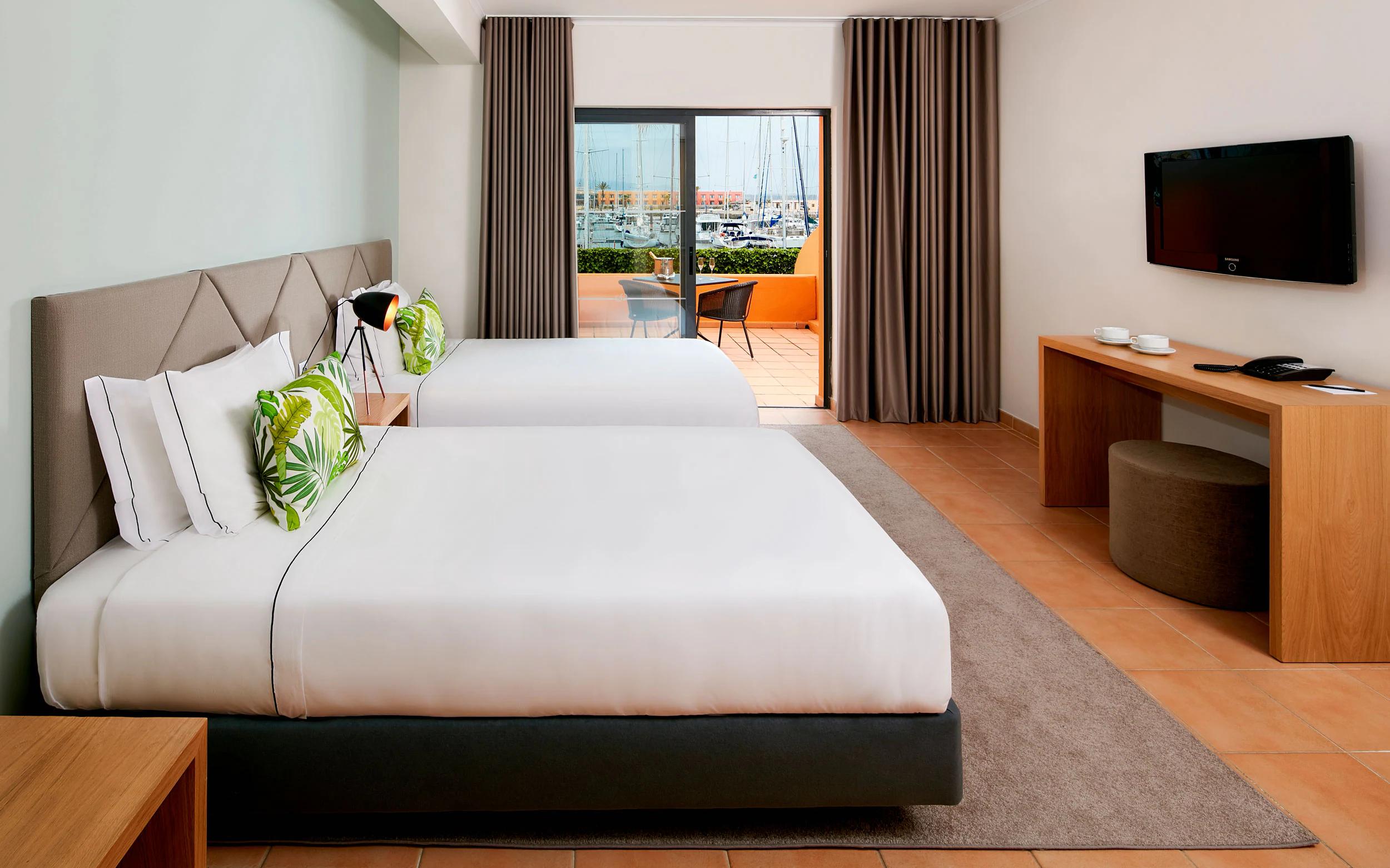 Twin double bed suite at NH Marina Portimão