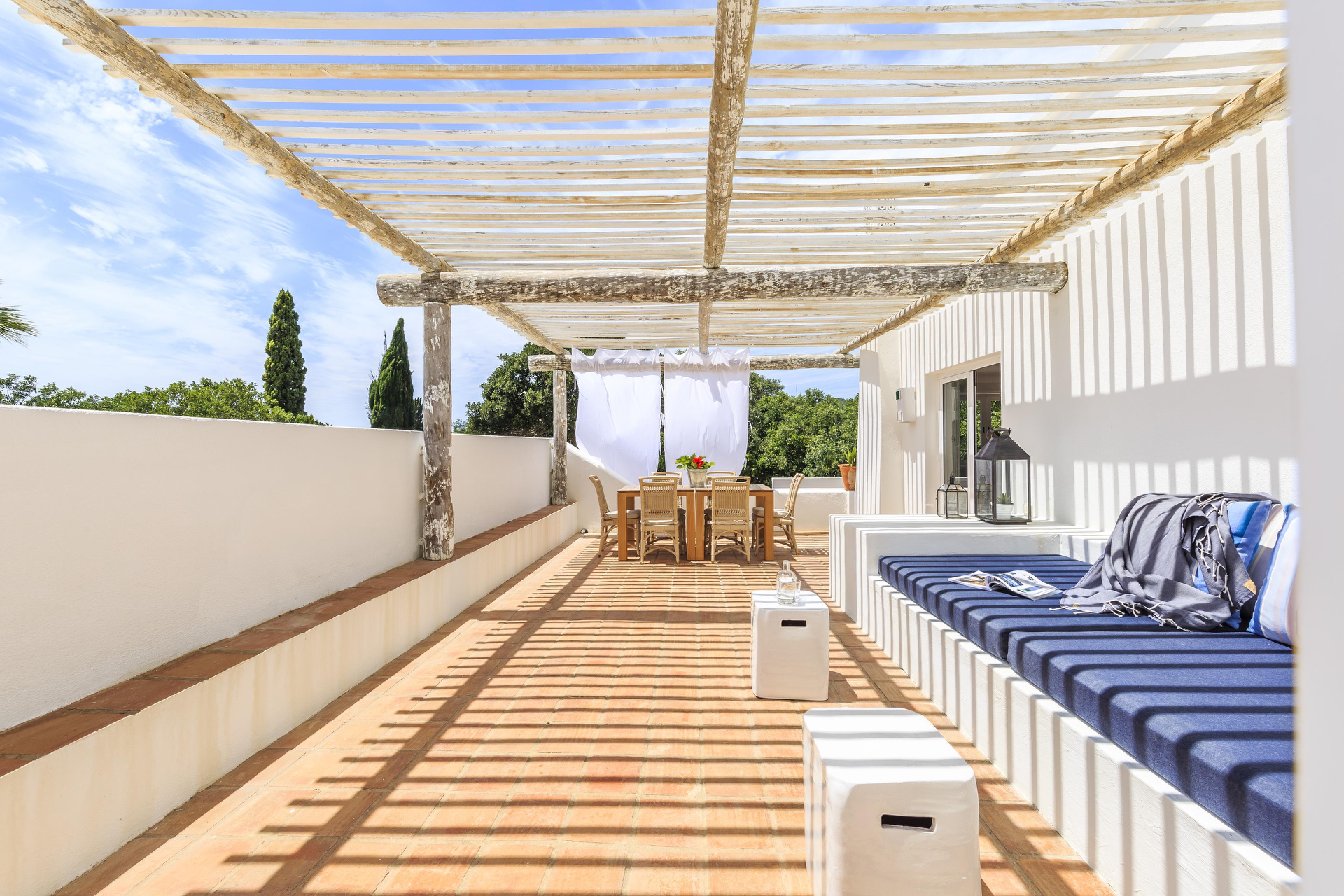 Balcony lounging area at Octant Hotel Vila Monte