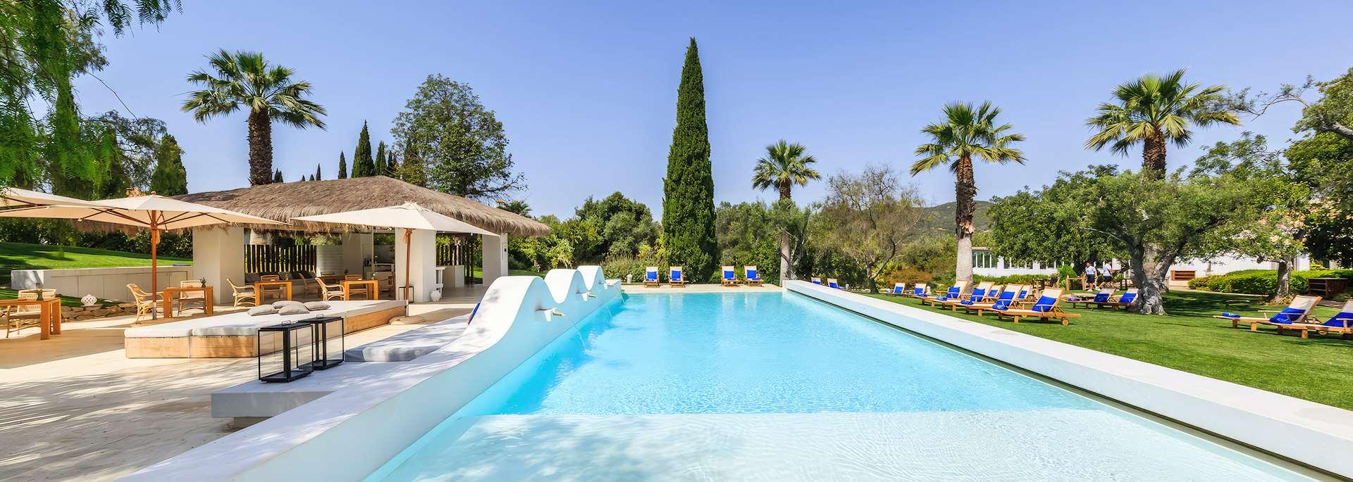Outdoor swimming pool at Octant Hotel Vila Monte