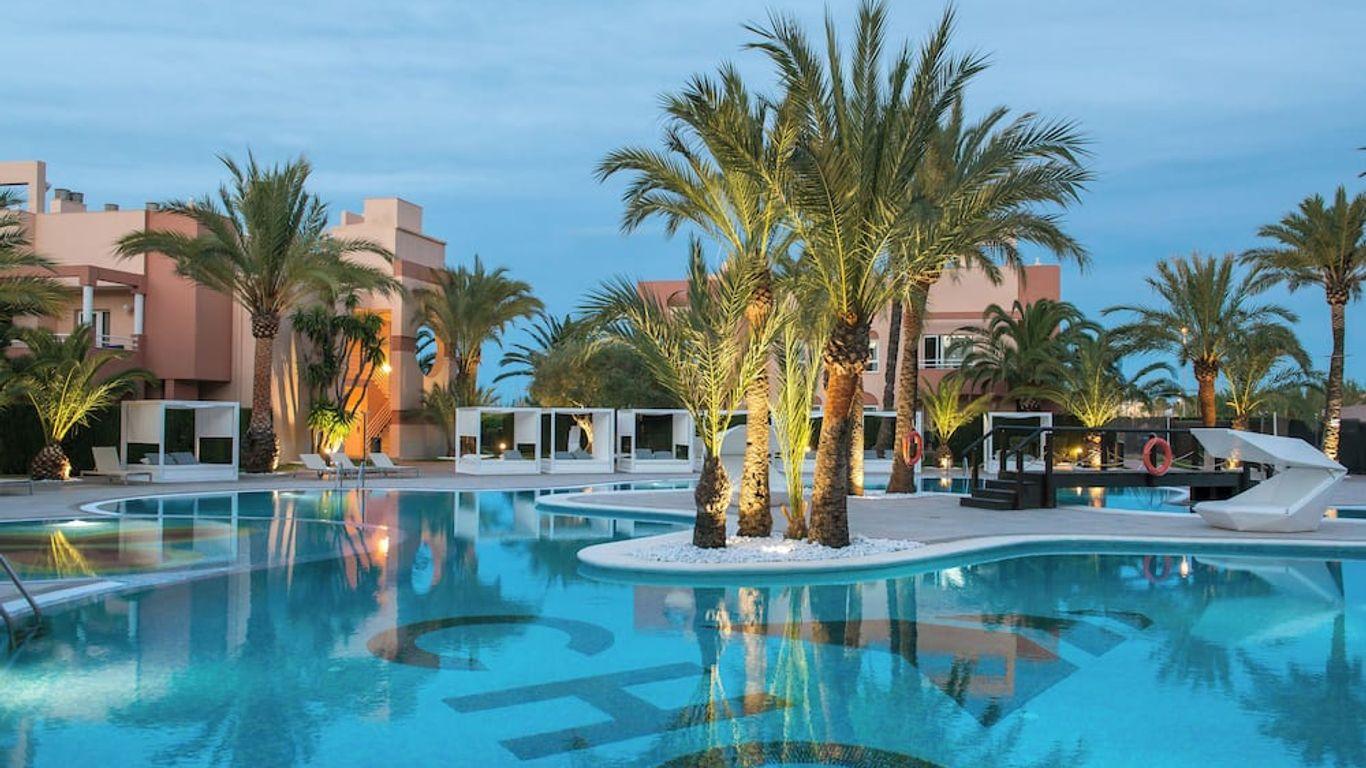 Panoramic view of the outdoor swimming pool at Oliva Nova Beach & Golf Hotel