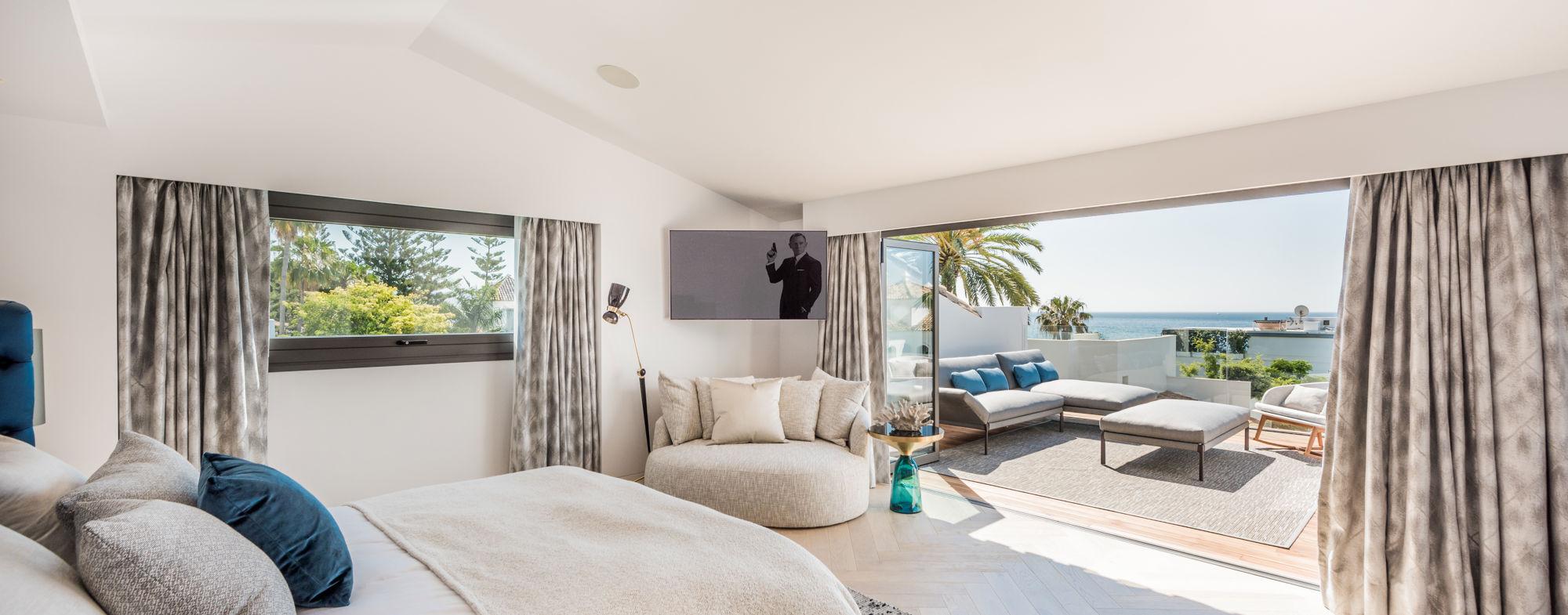 Double bed suite with a patio space at Puente Romano Beach Resort