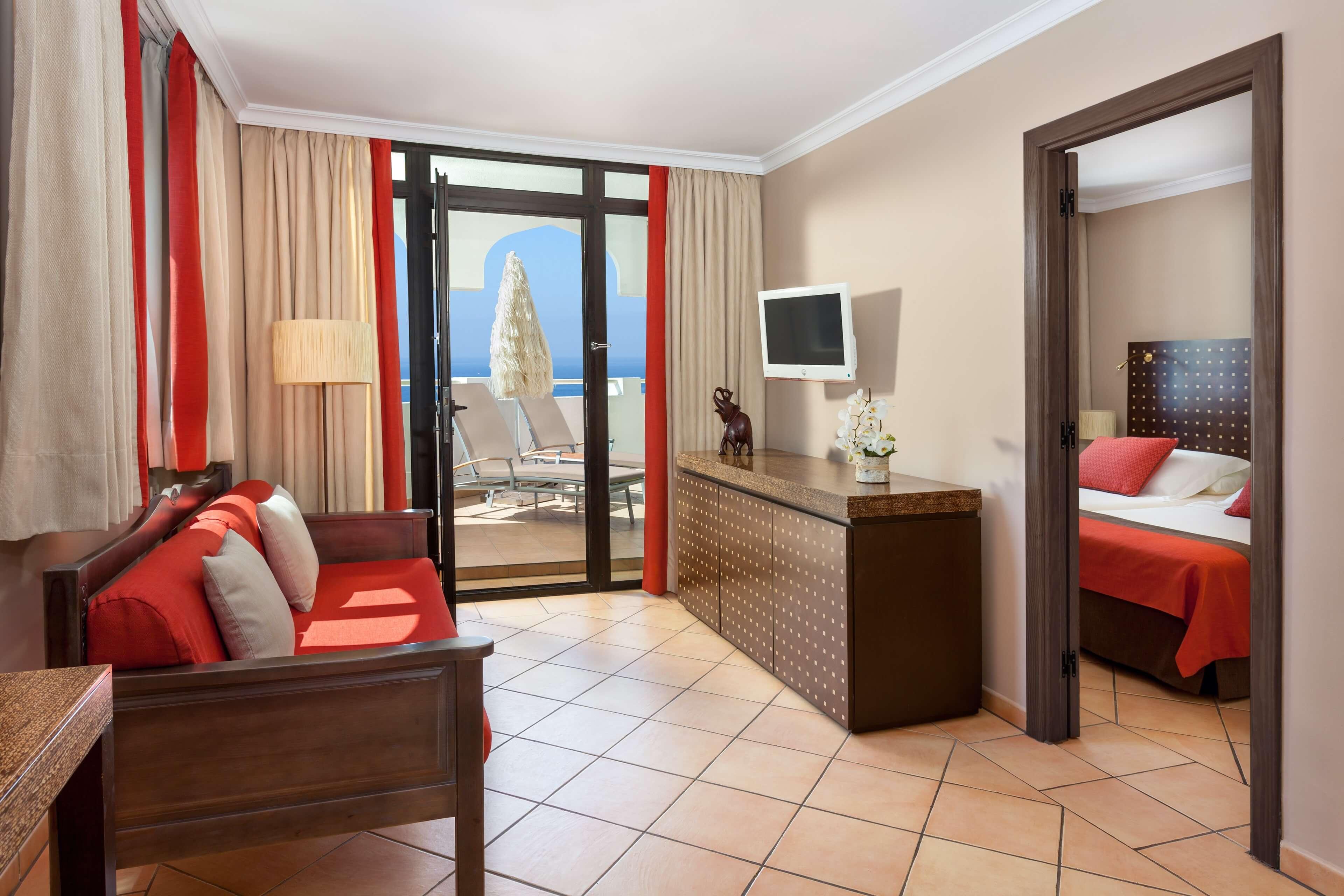 Separate bedroom and living room at Seaside Sandy Beach