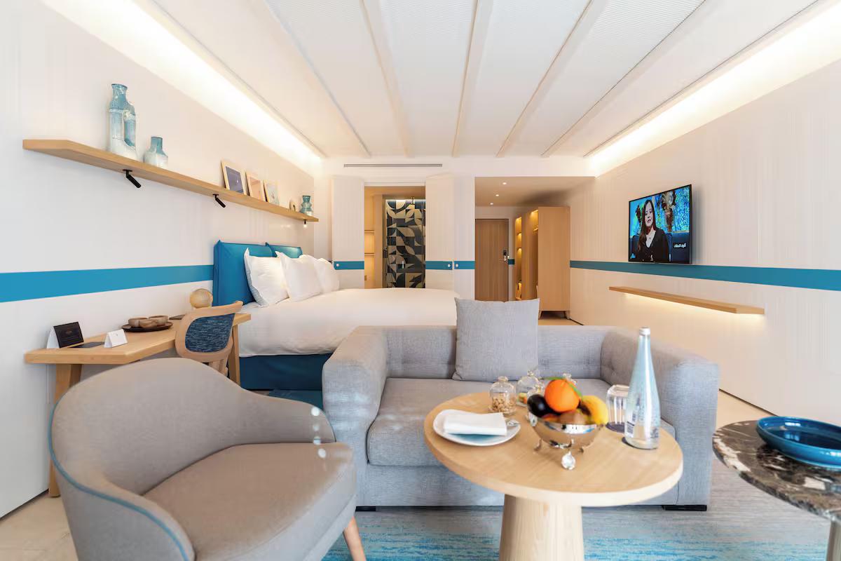 Spacious double bed suite with a separate lounging area at The View Agadir