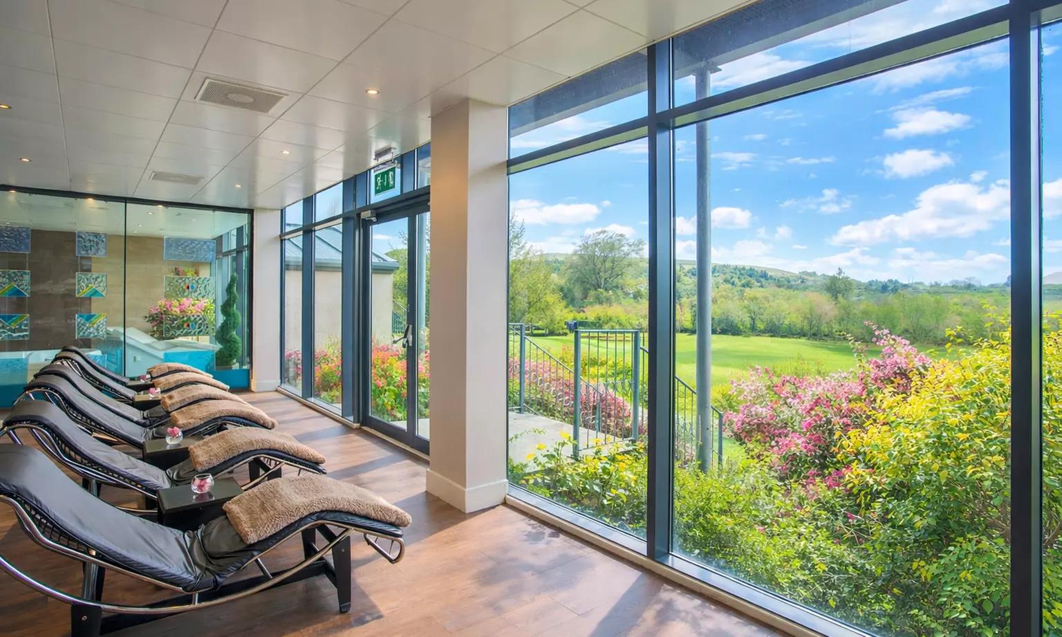 Indoor pool and sunbeds as part of the spa facilities at Castle Dargan Golf Hotel