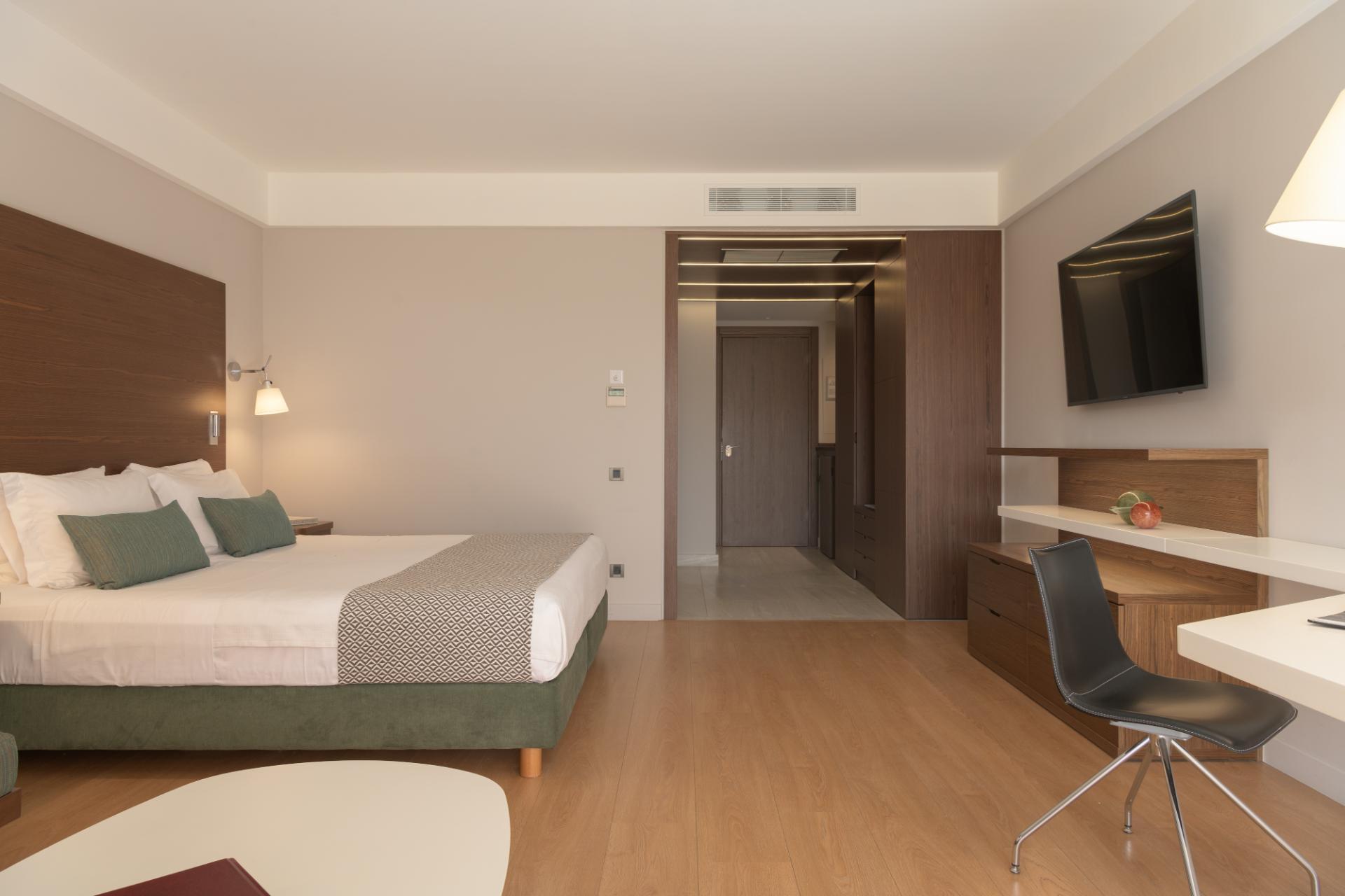 Modern double bed suite at Crete Golf Club & Hotel