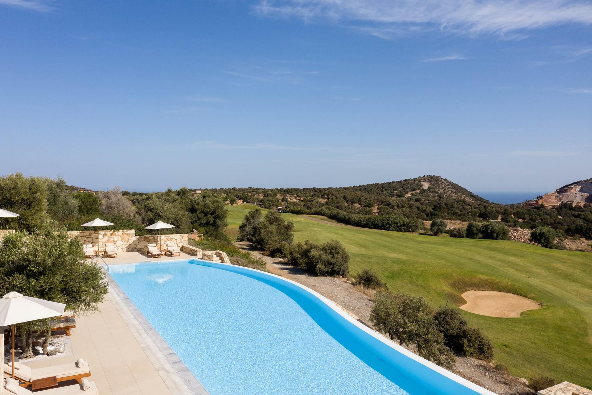 Outdoor swimming pool with views of the golf course