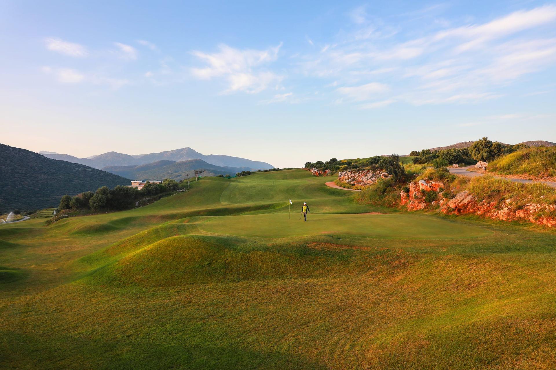 A well maintained fairway with rolling dunes at Crete Golf Club & Hotel