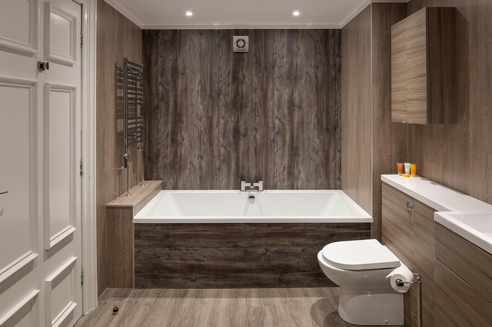 Luxurious bathroom as part of a suite at Fairfield House Hotel
