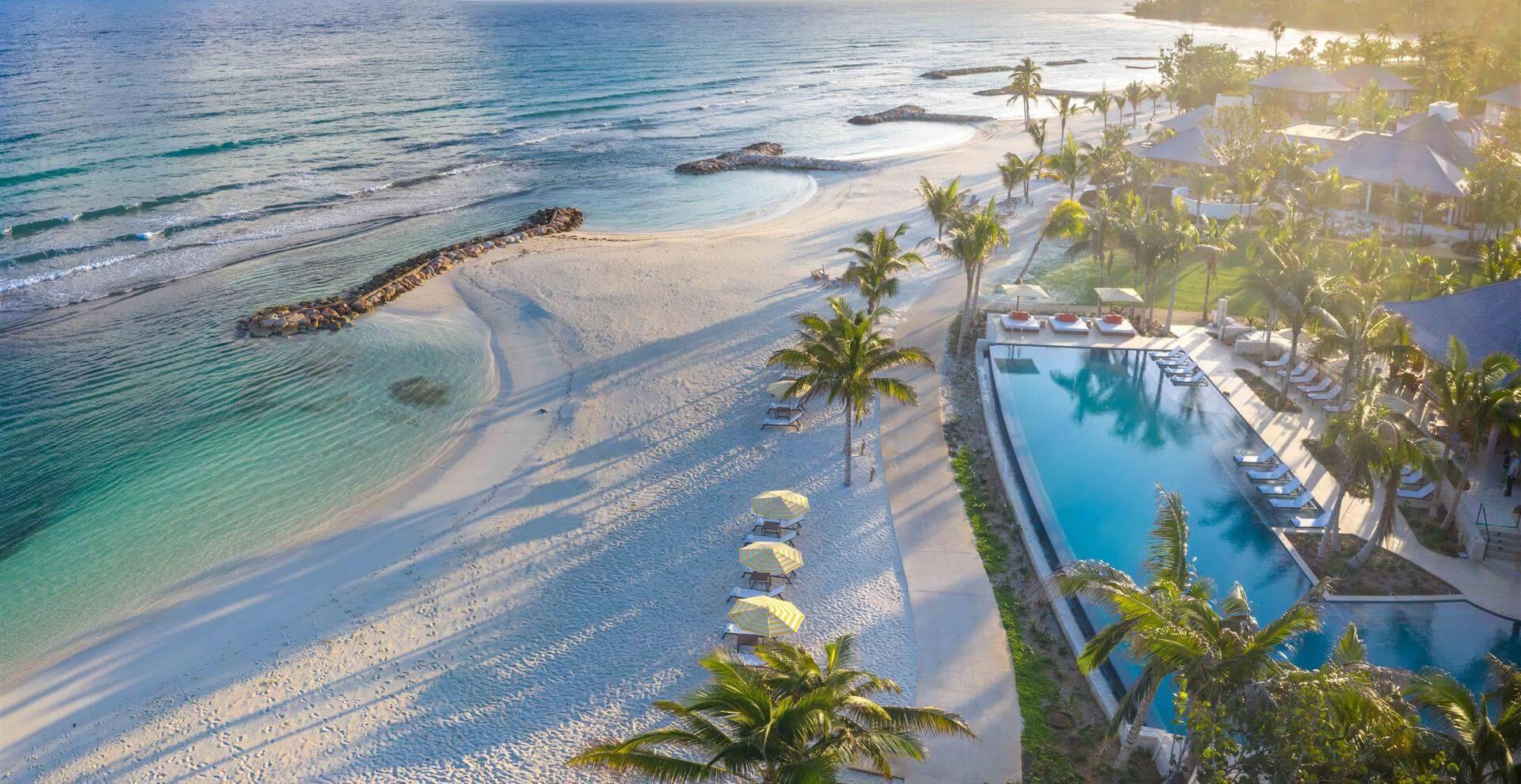Overhead view of the beach and outdoor swimming pool at Half Moon