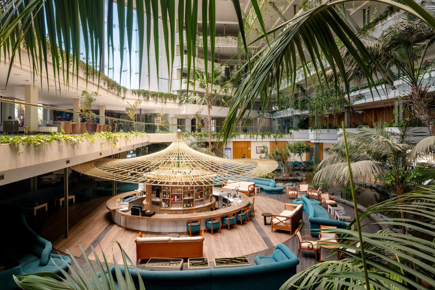 Lobby area designed with trees giving a nature vibe at Alexandre Teguise Playa