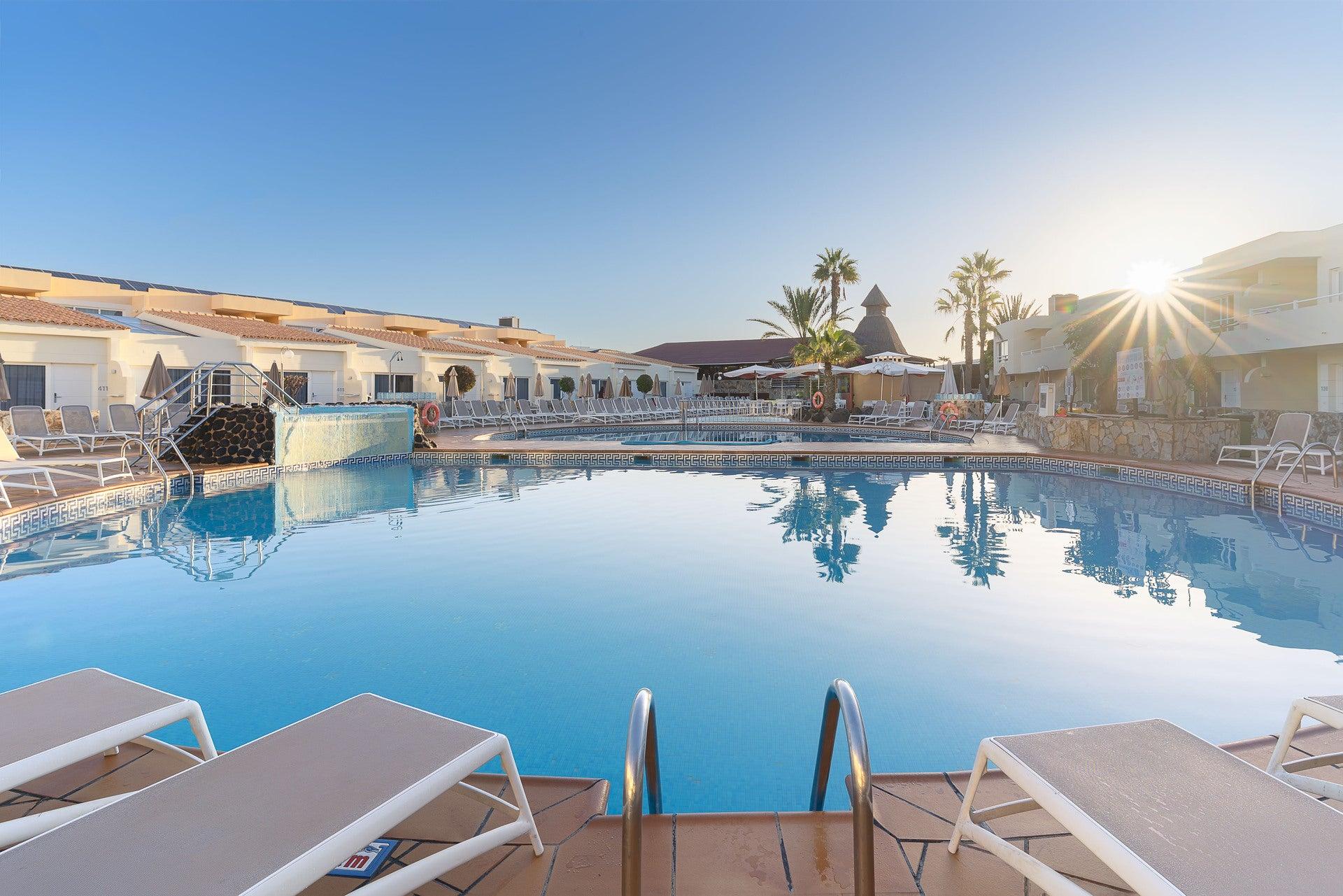 Outdoor swimming pool at Alexandre Teguise Playa