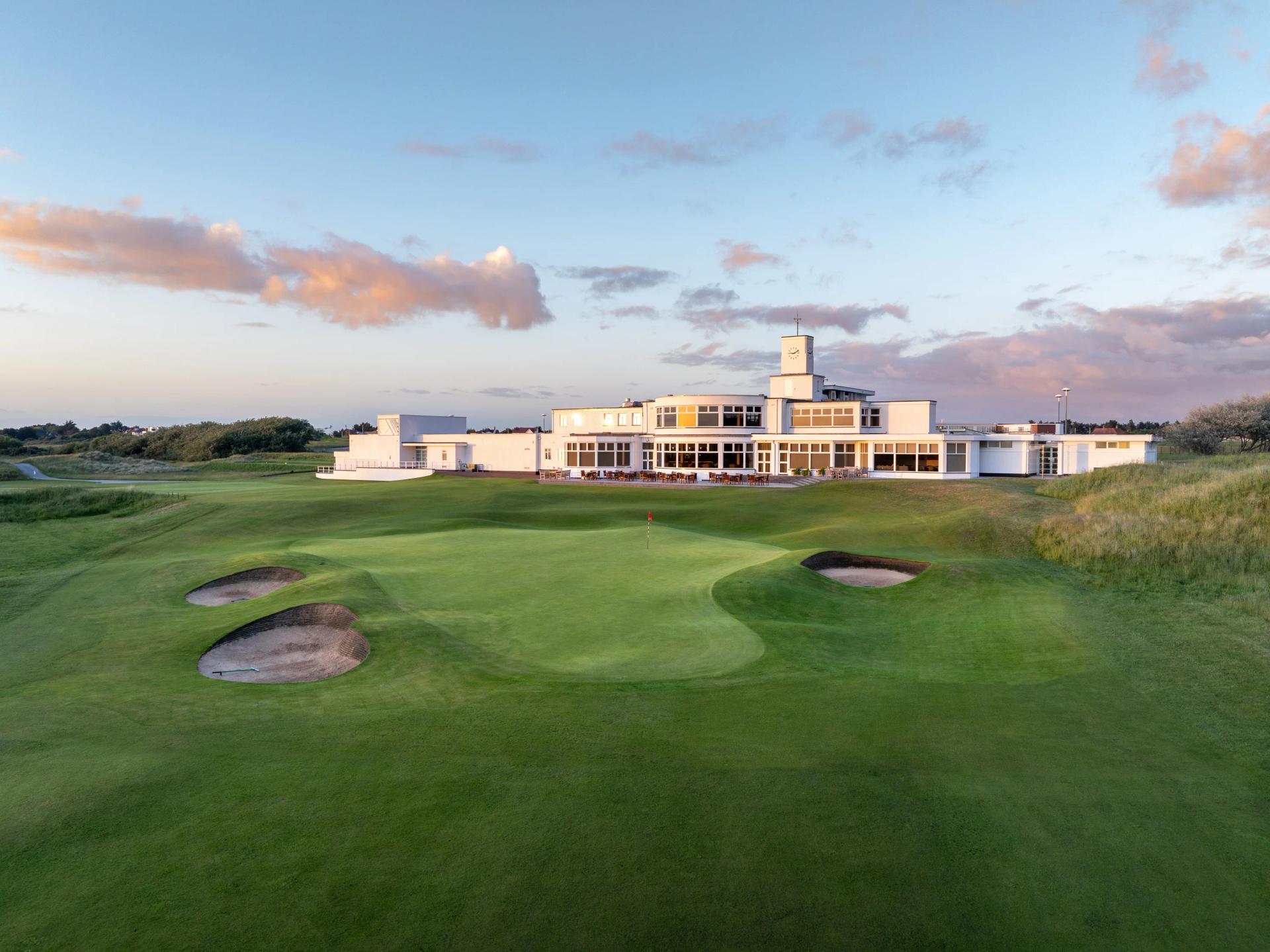 Panoramic view of the Royal Birkdale Golf Clubhouse overlooking the course nestled with sand bunkers