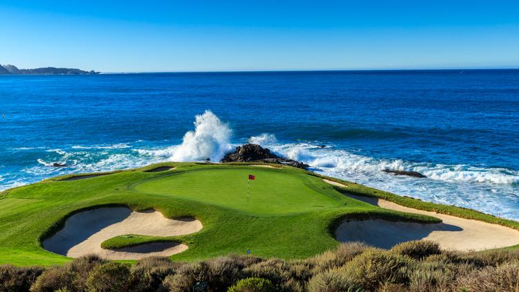 Waves crashing into a coastal green